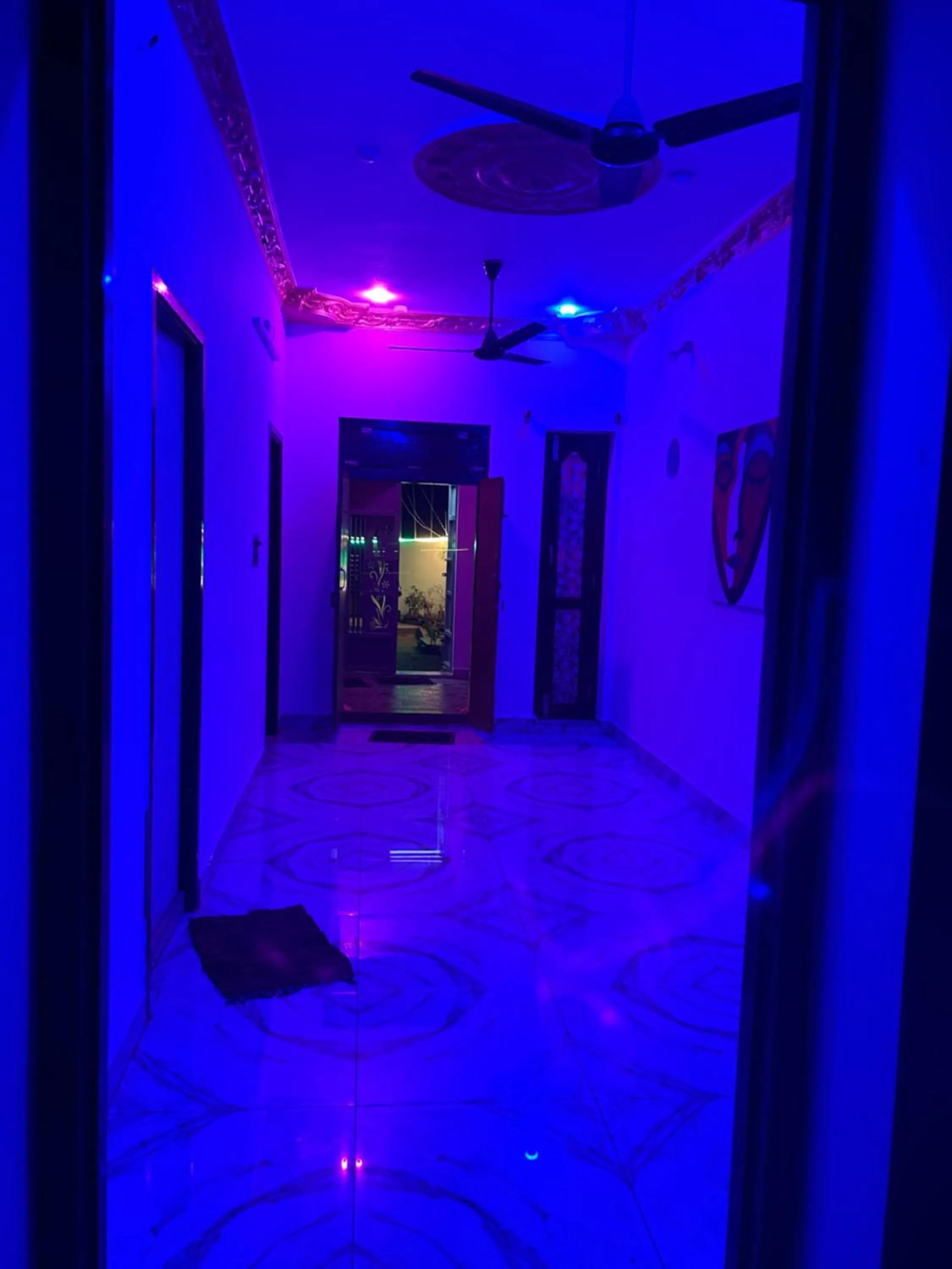 Communal lounge/ TV room in The Last Stop Backpackers Hostel