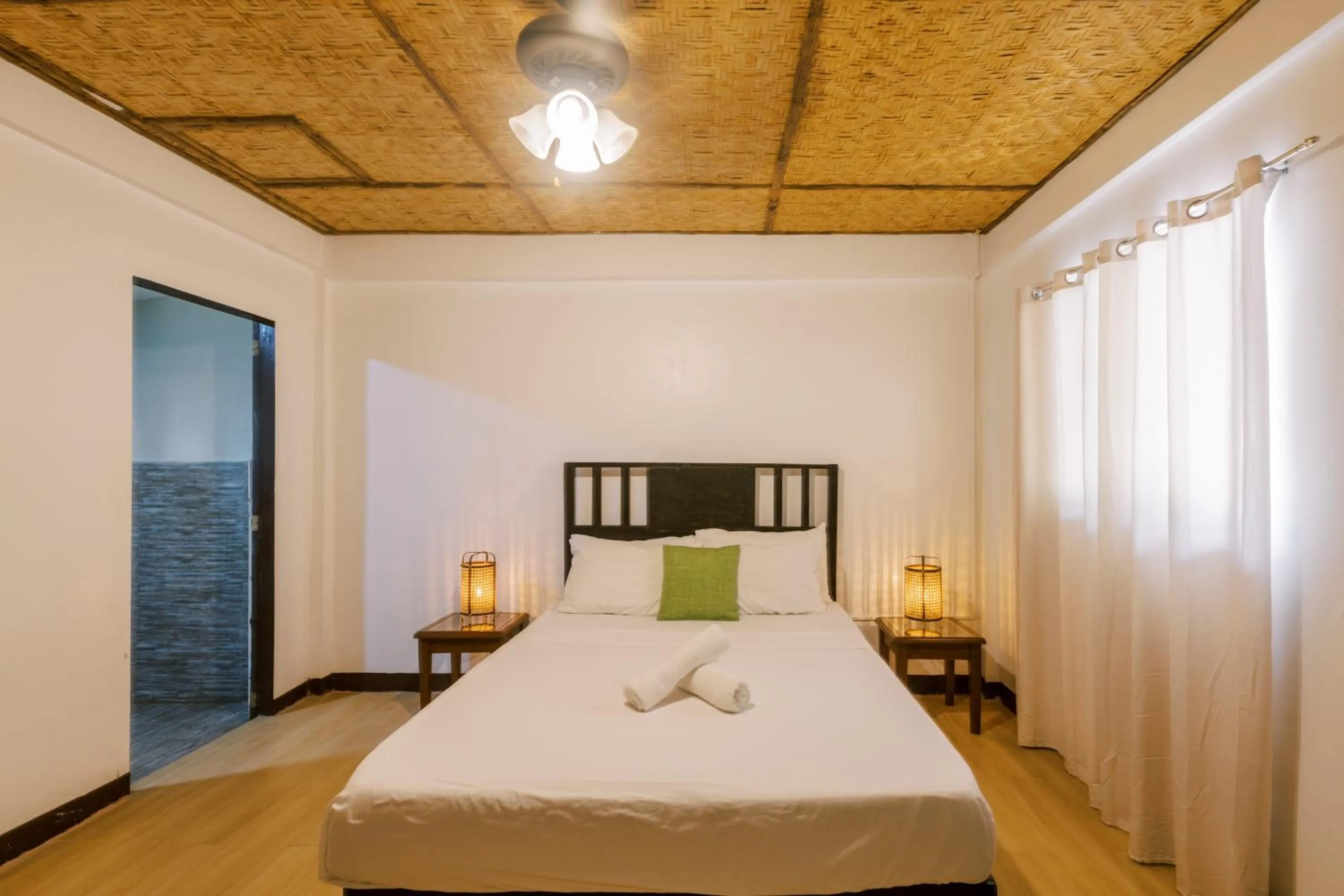 Bed in Nabulao Beach Resort