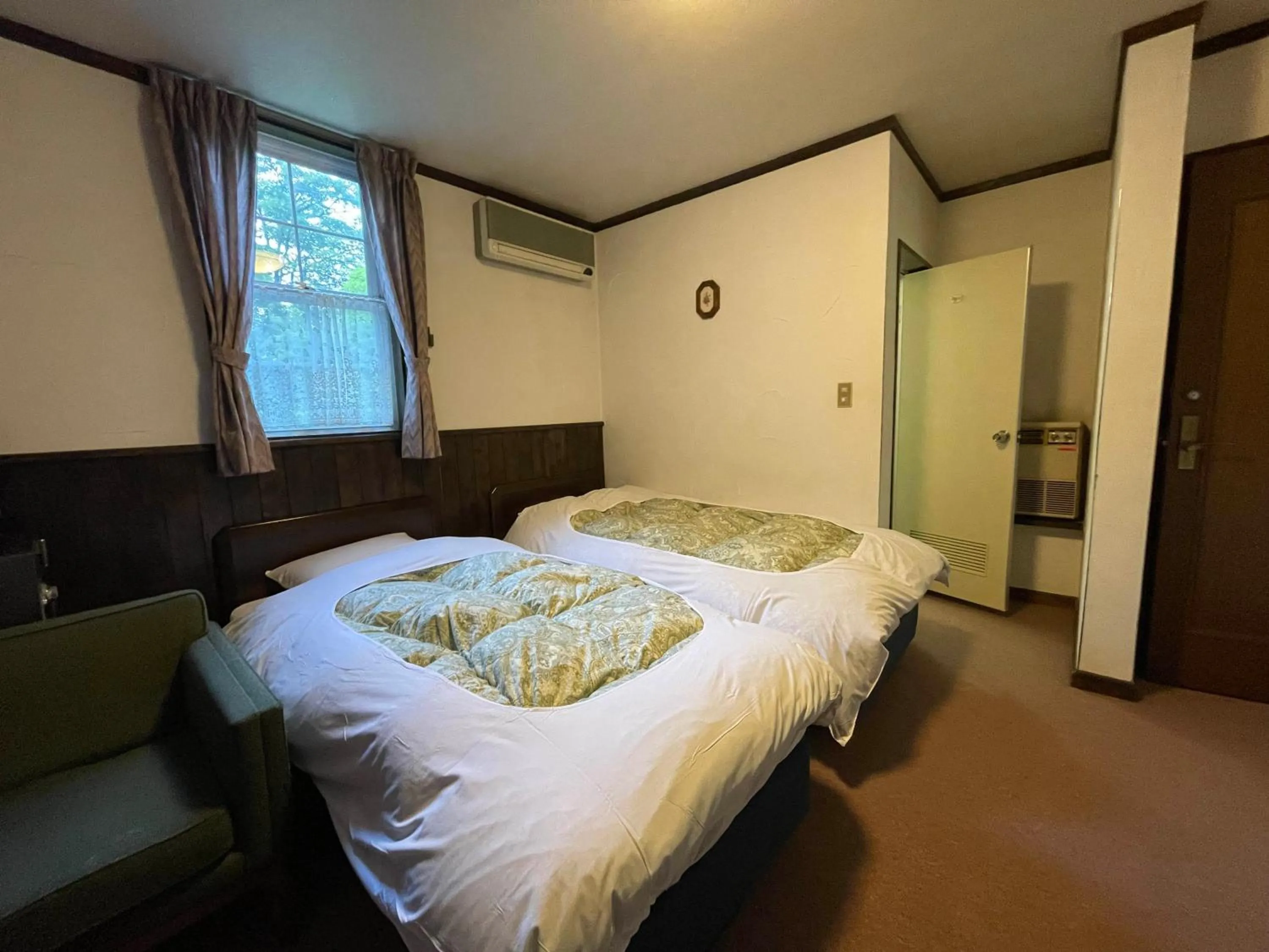 Bed in Hotel Sejour Mint in Hakuba