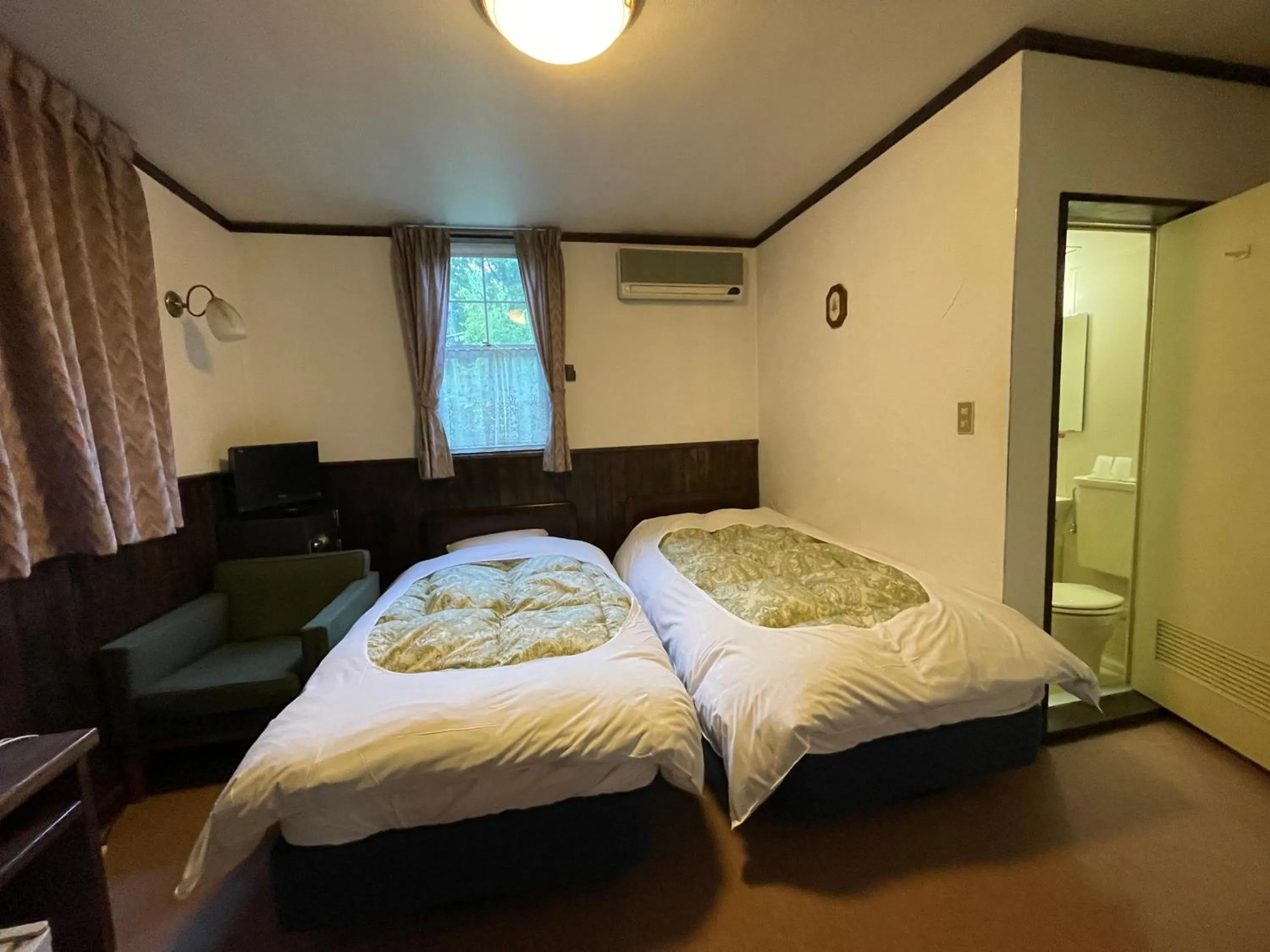 Bed in Hotel Sejour Mint in Hakuba