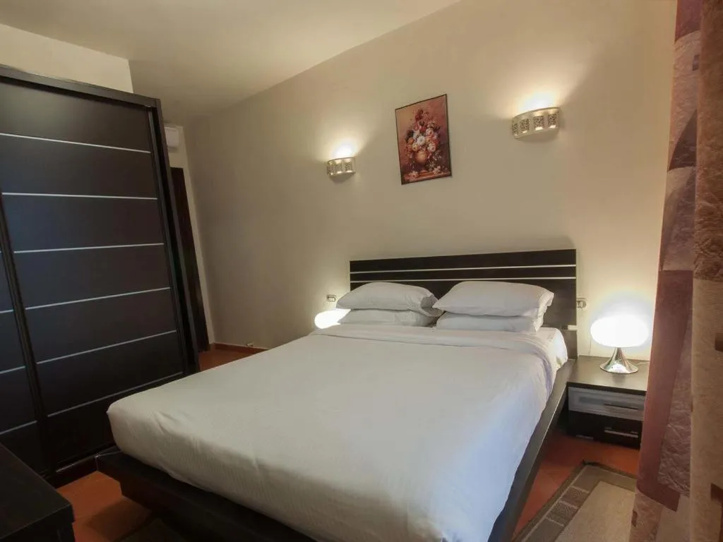 Bed in Porto Golf Marina Apartments powered By Amer-Group