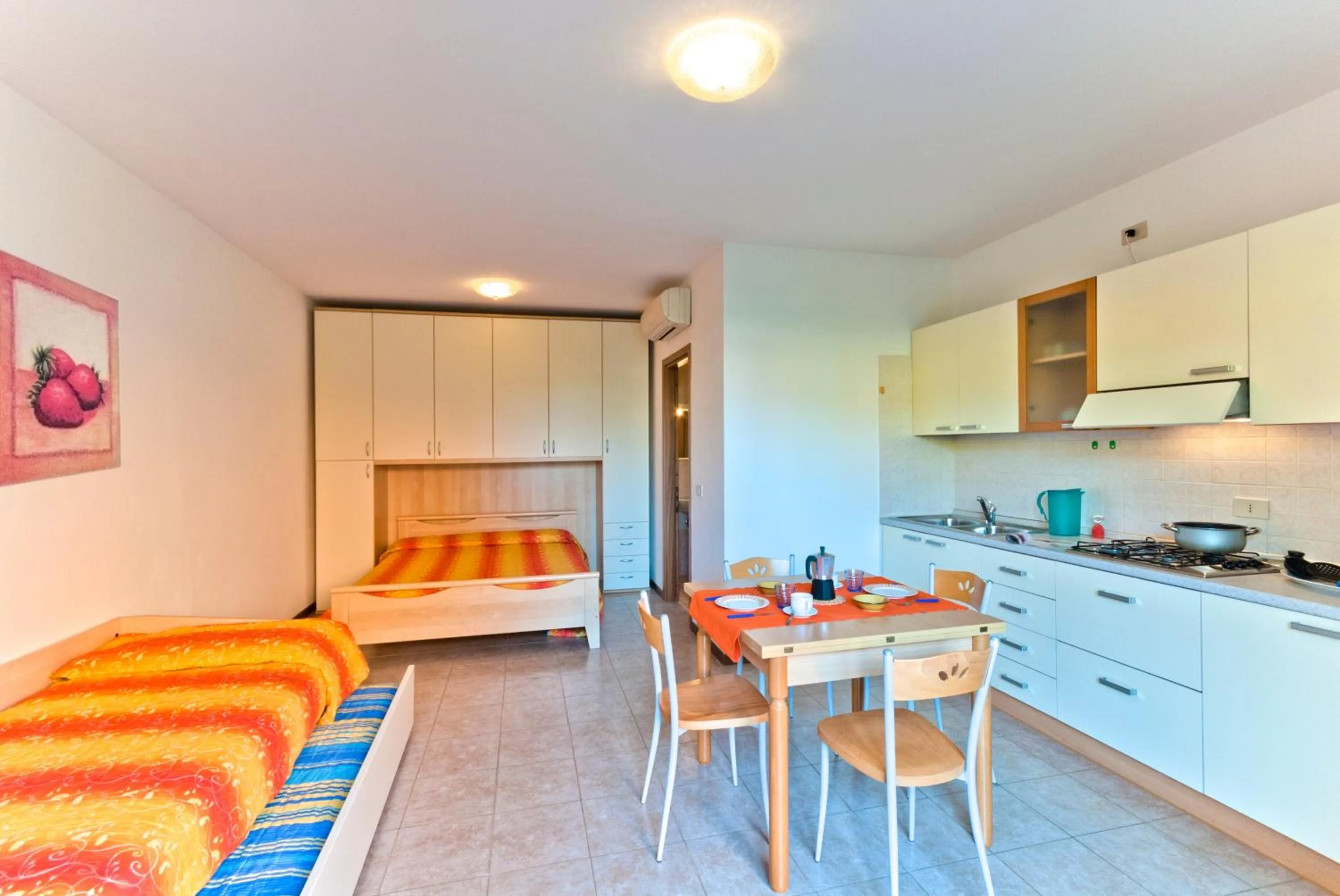 Living room, Bed in Villaggio Cristina
