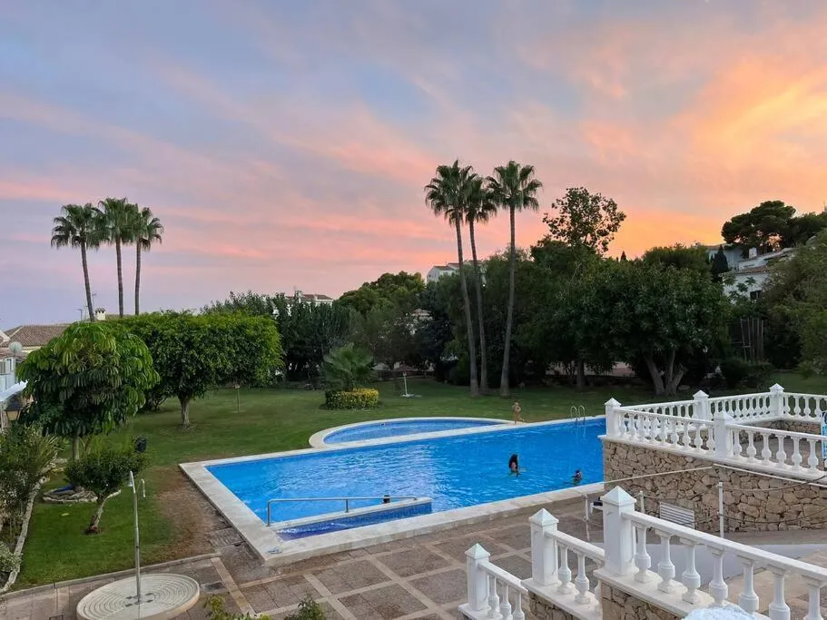 Duplex in residential complex with pool