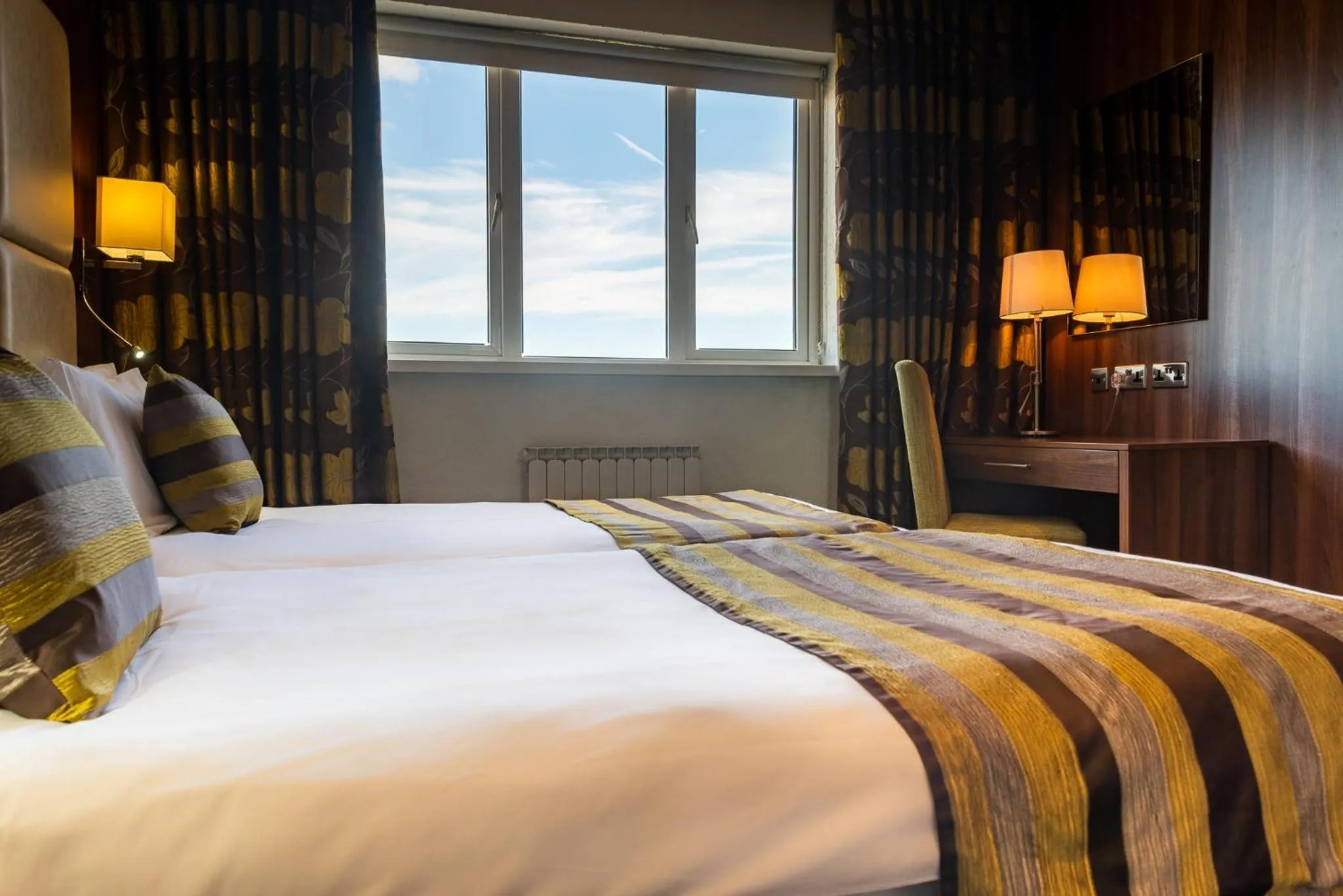 Bed in Hotel Ambassadeur