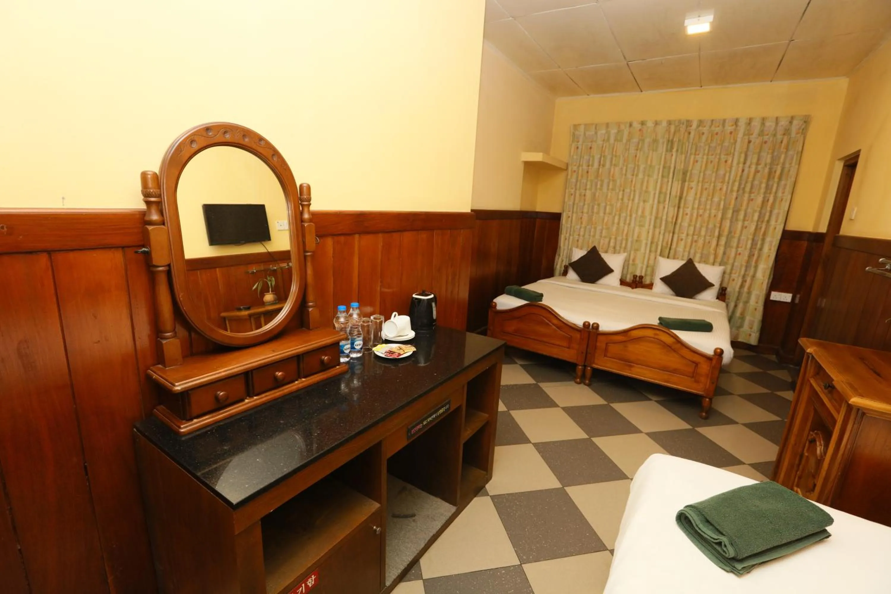 Bed in Srilak View Holiday Inn