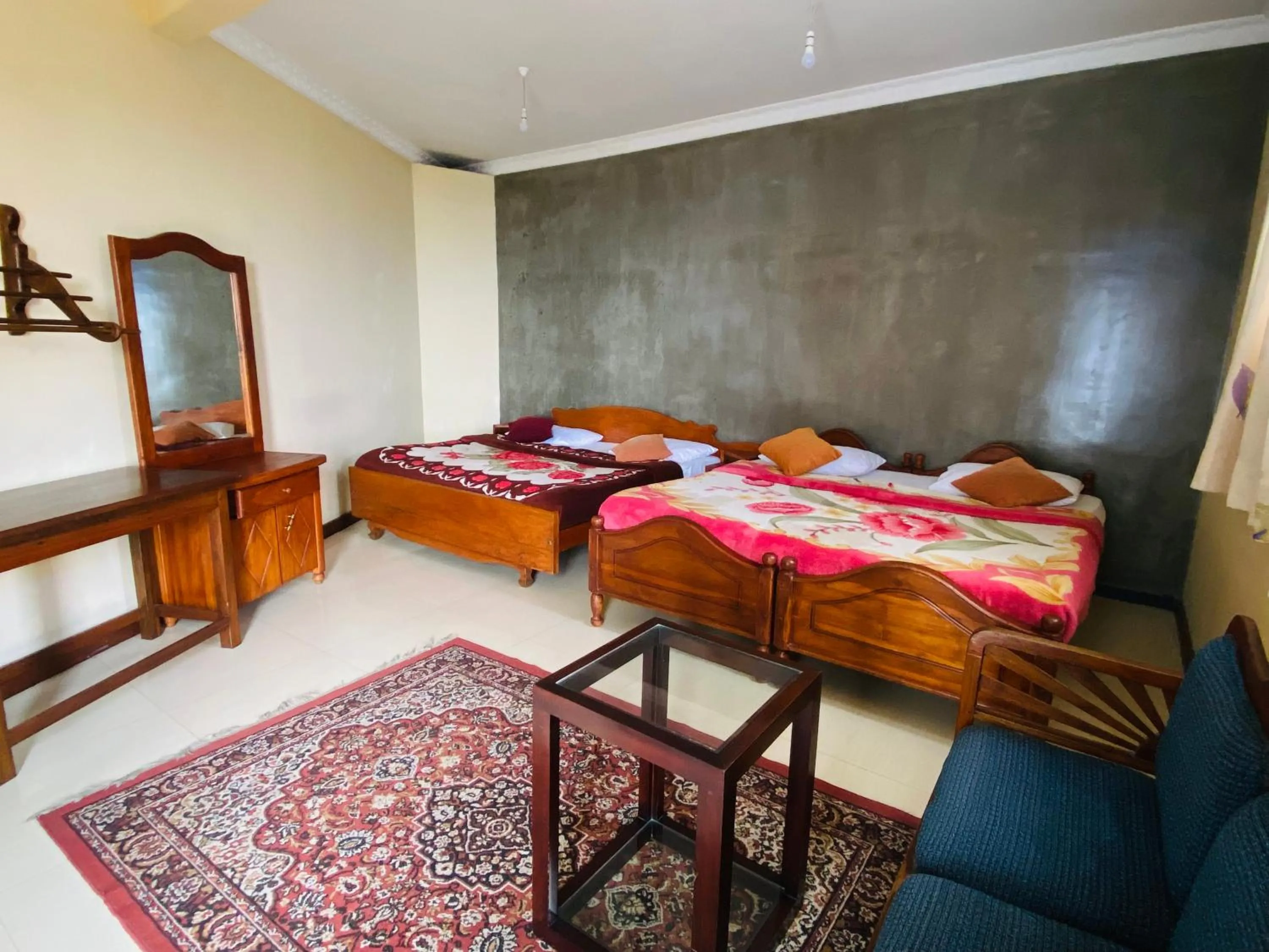 Bed in Srilak View Holiday Inn