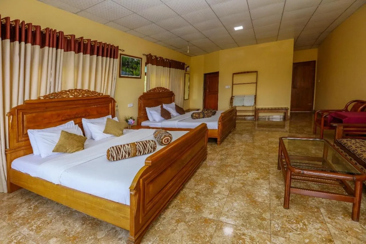 Bed in Srilak View Holiday Inn