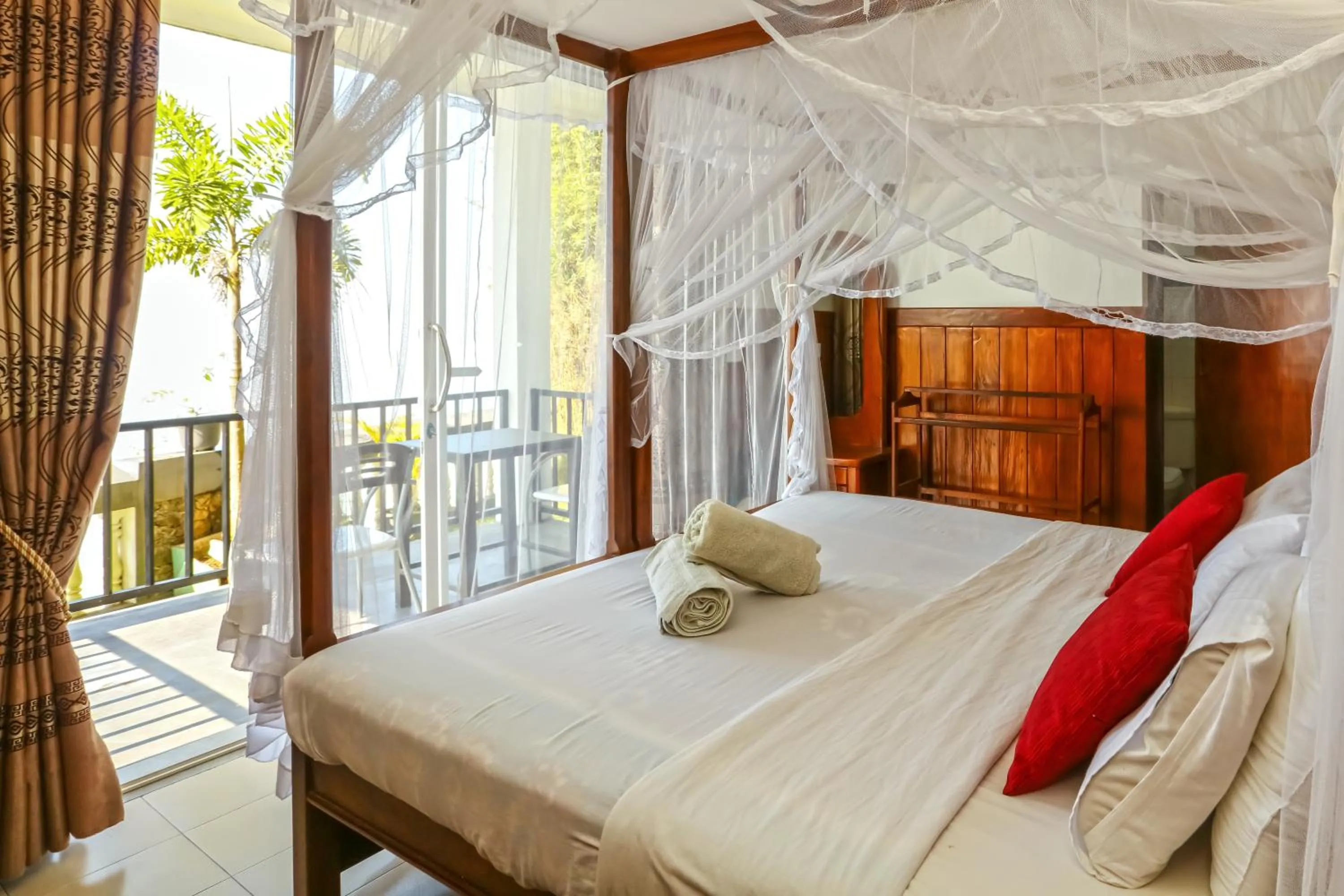 Bed in Srilak View Holiday Inn