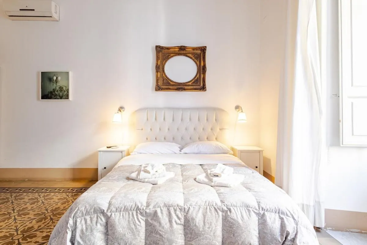 Bed in Elephant's Smile B&B