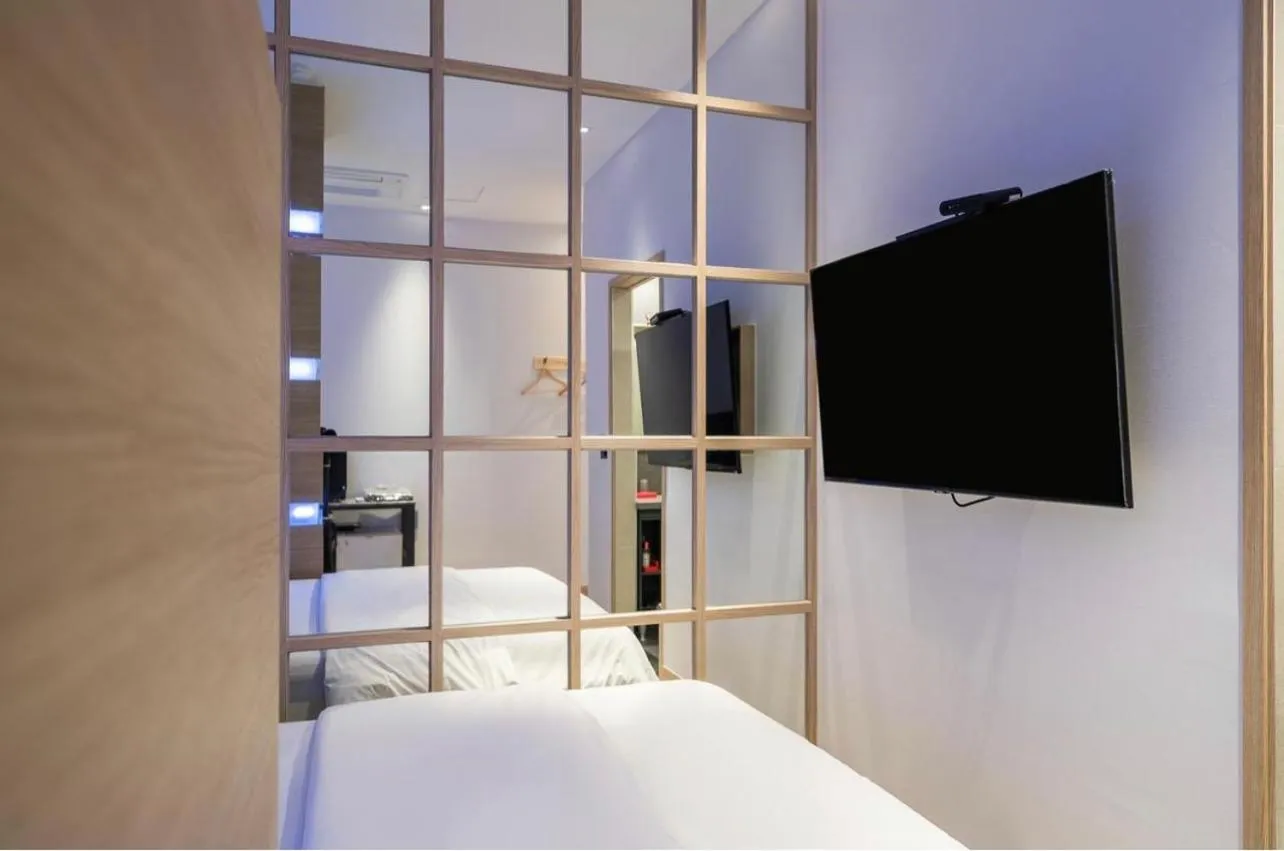 Bed in HOTEL MYEONG JAK