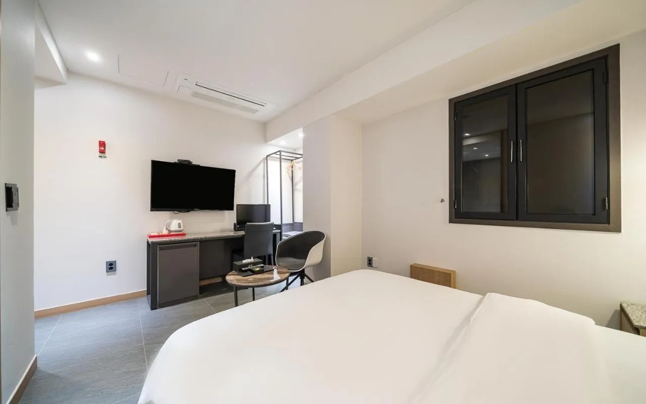 Bed in HOTEL MYEONG JAK