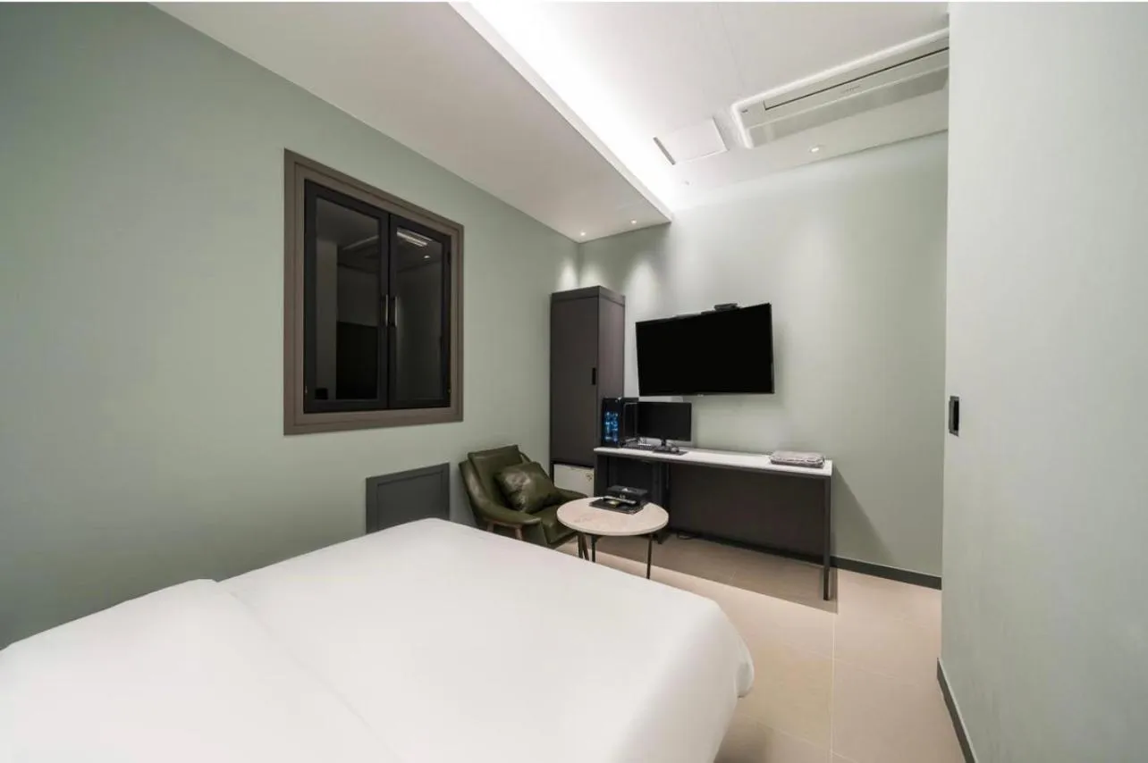 Bed in HOTEL MYEONG JAK