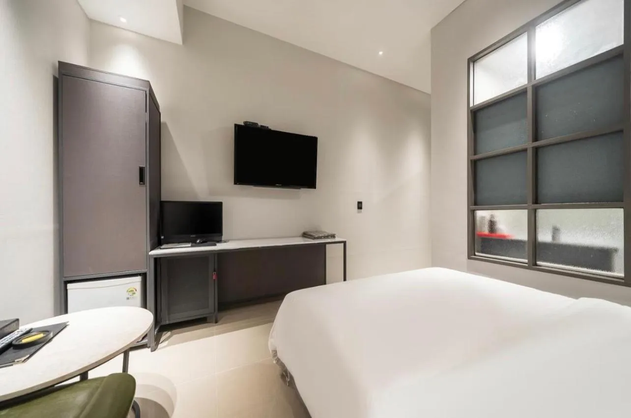 Bed in HOTEL MYEONG JAK