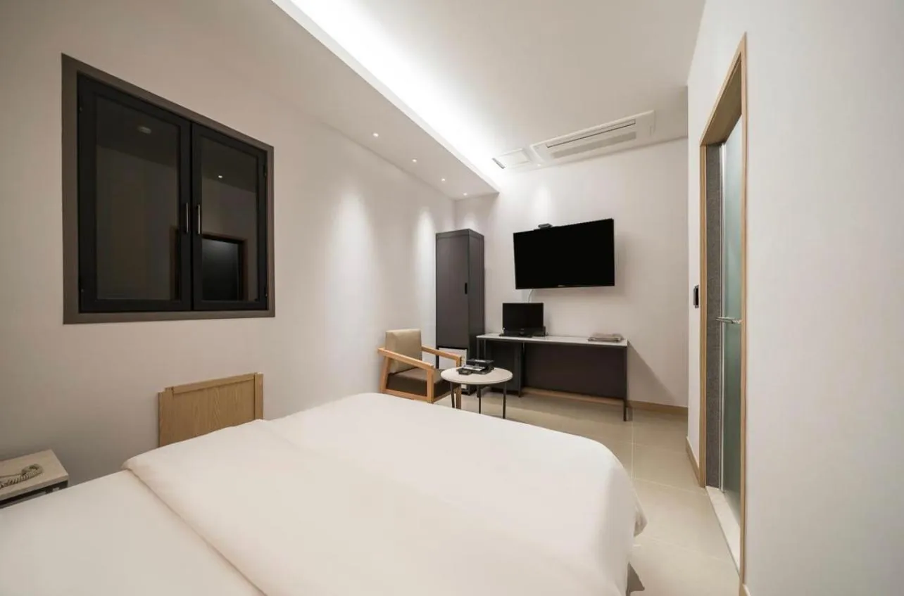 Bed in HOTEL MYEONG JAK