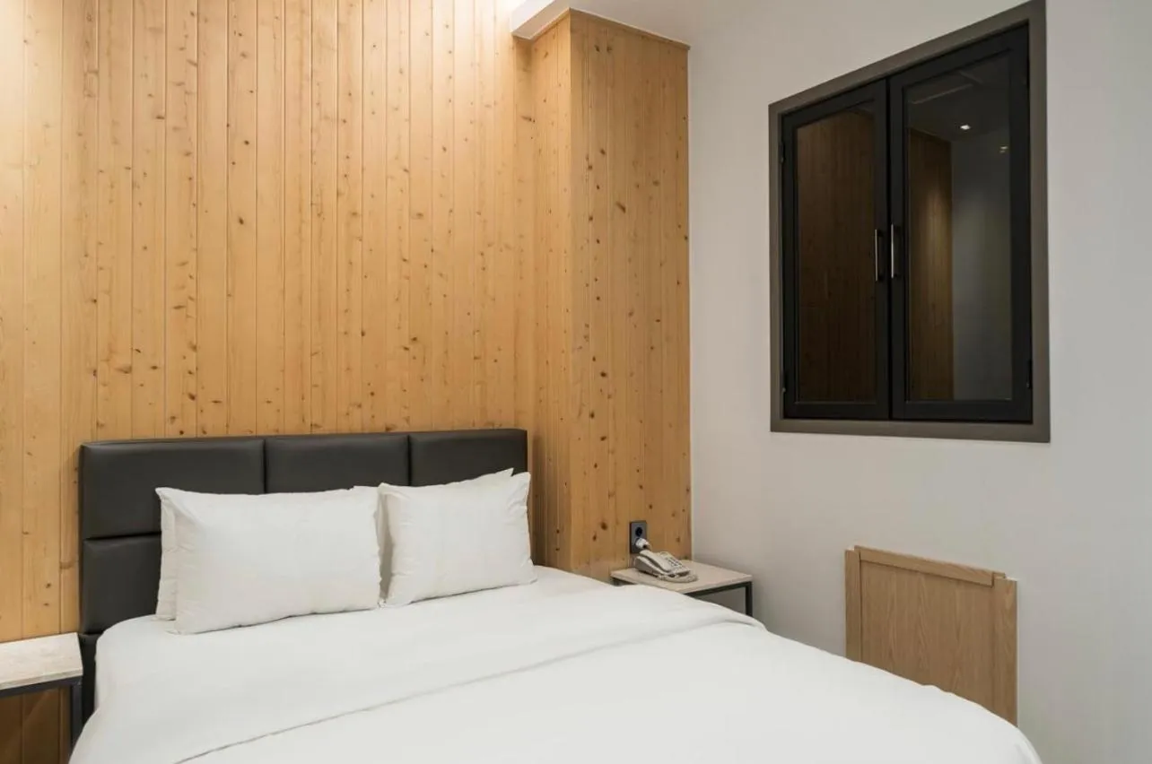 Bed in HOTEL MYEONG JAK