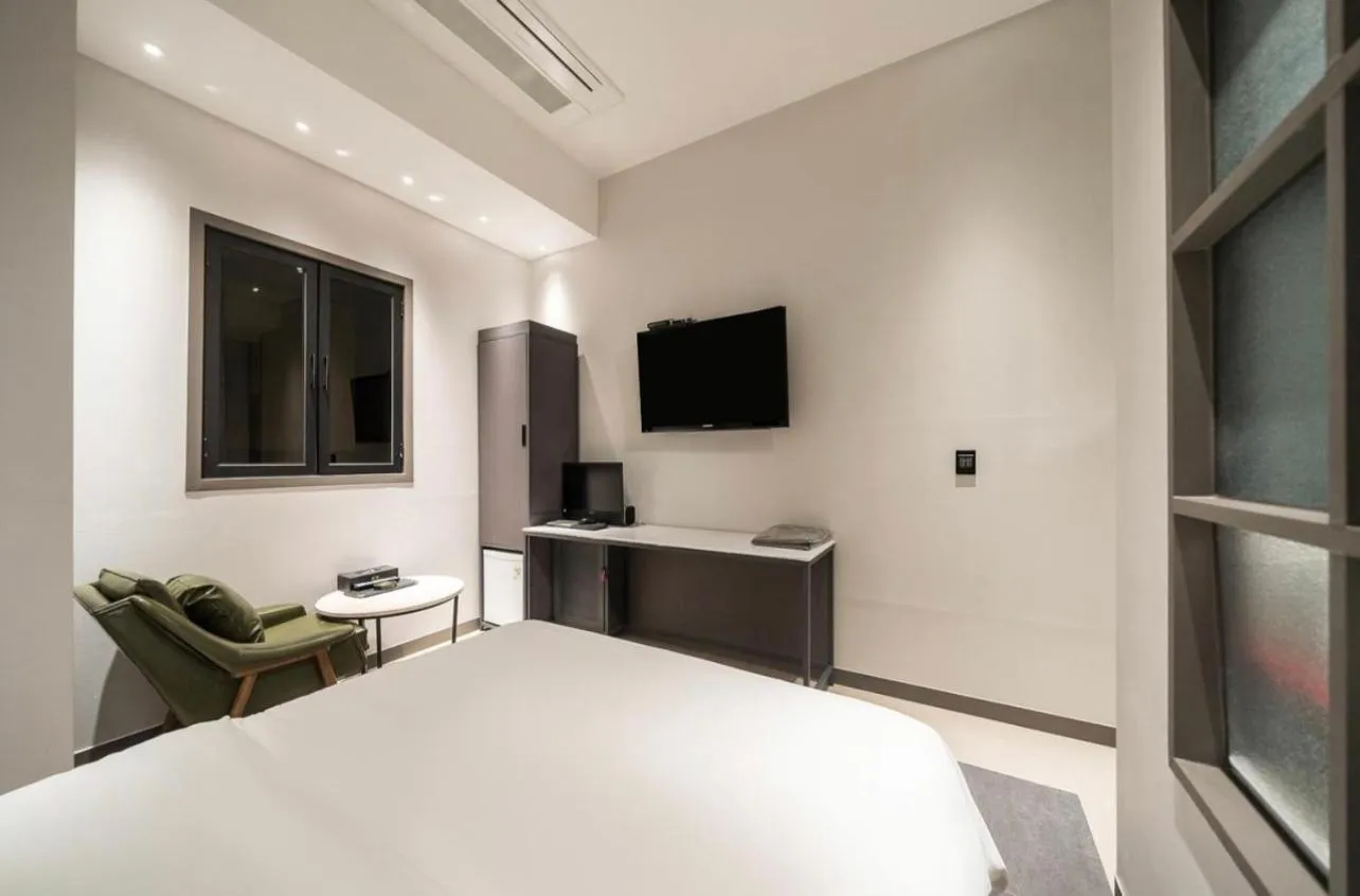 Bed in HOTEL MYEONG JAK