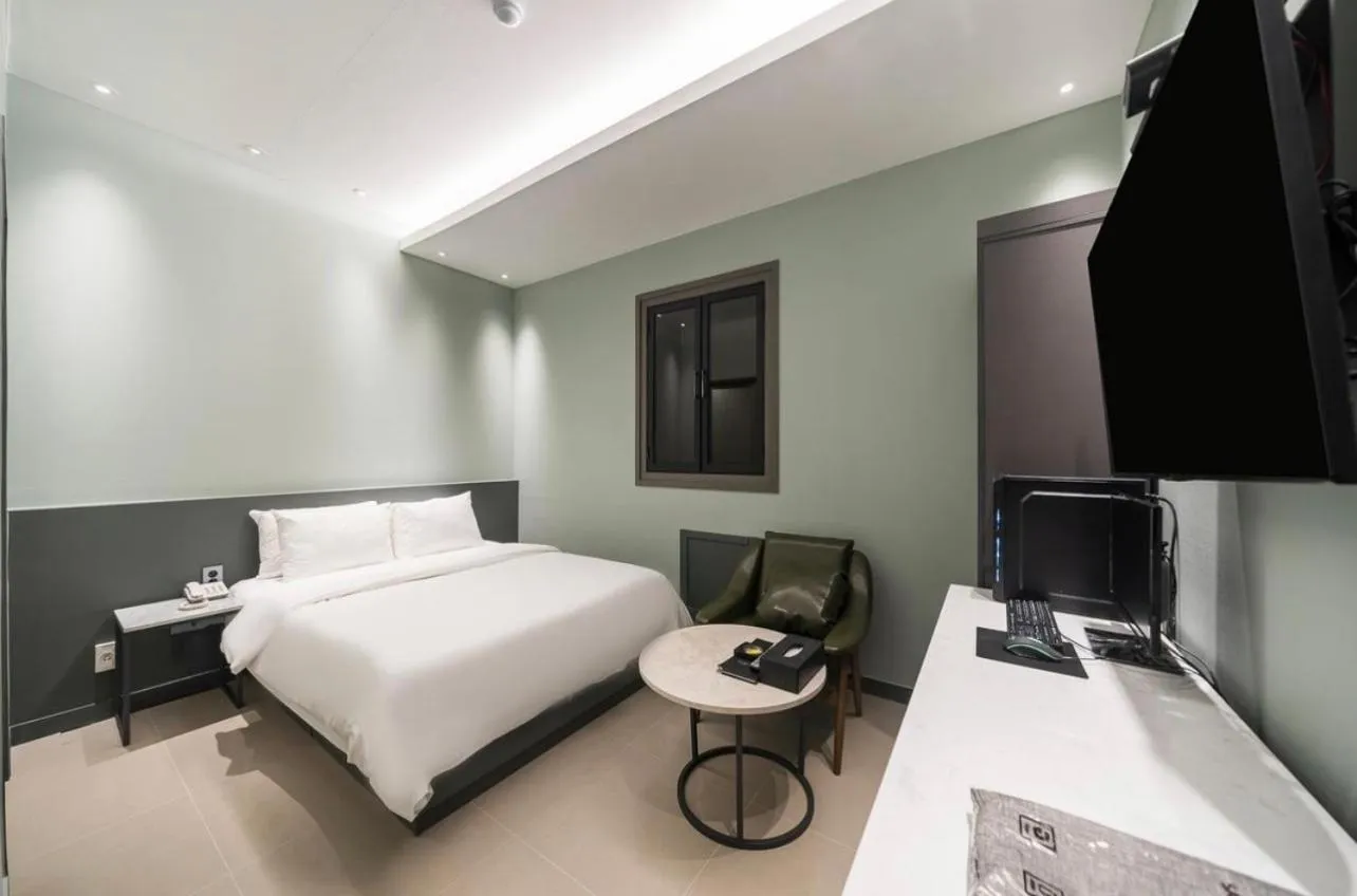 Bed in HOTEL MYEONG JAK