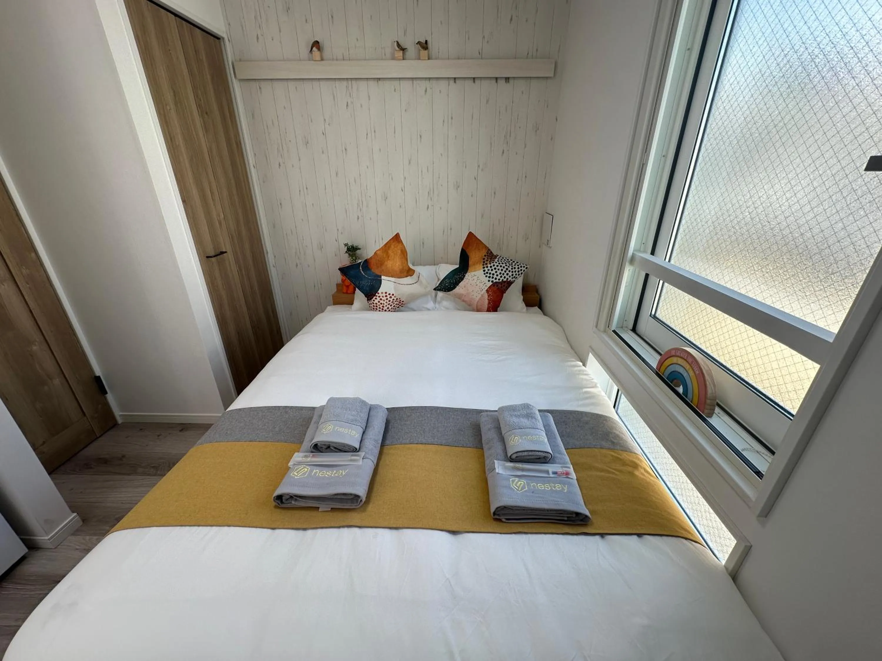 Bed in nestay apartment tokyo waseda