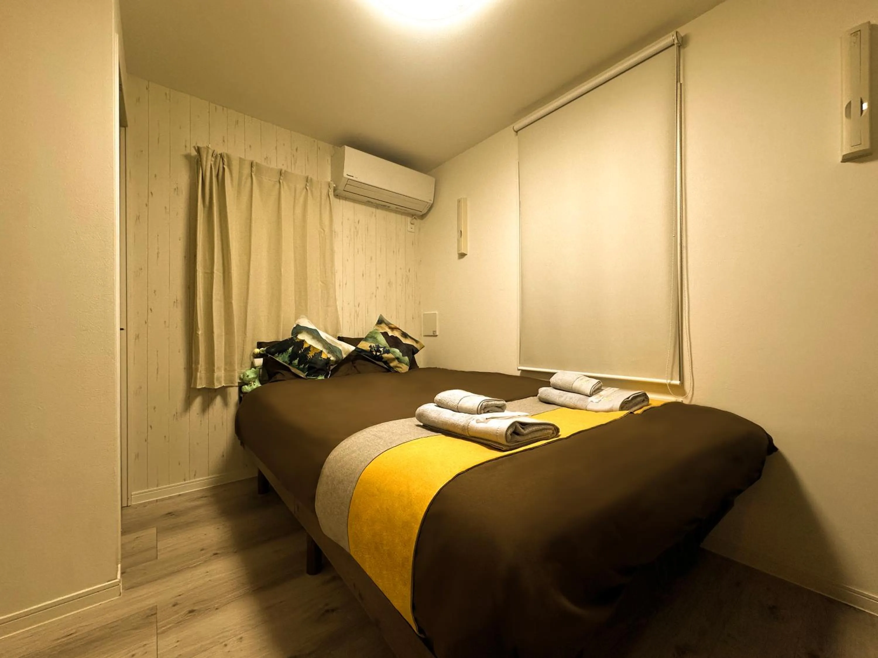 Bed in nestay apartment tokyo waseda