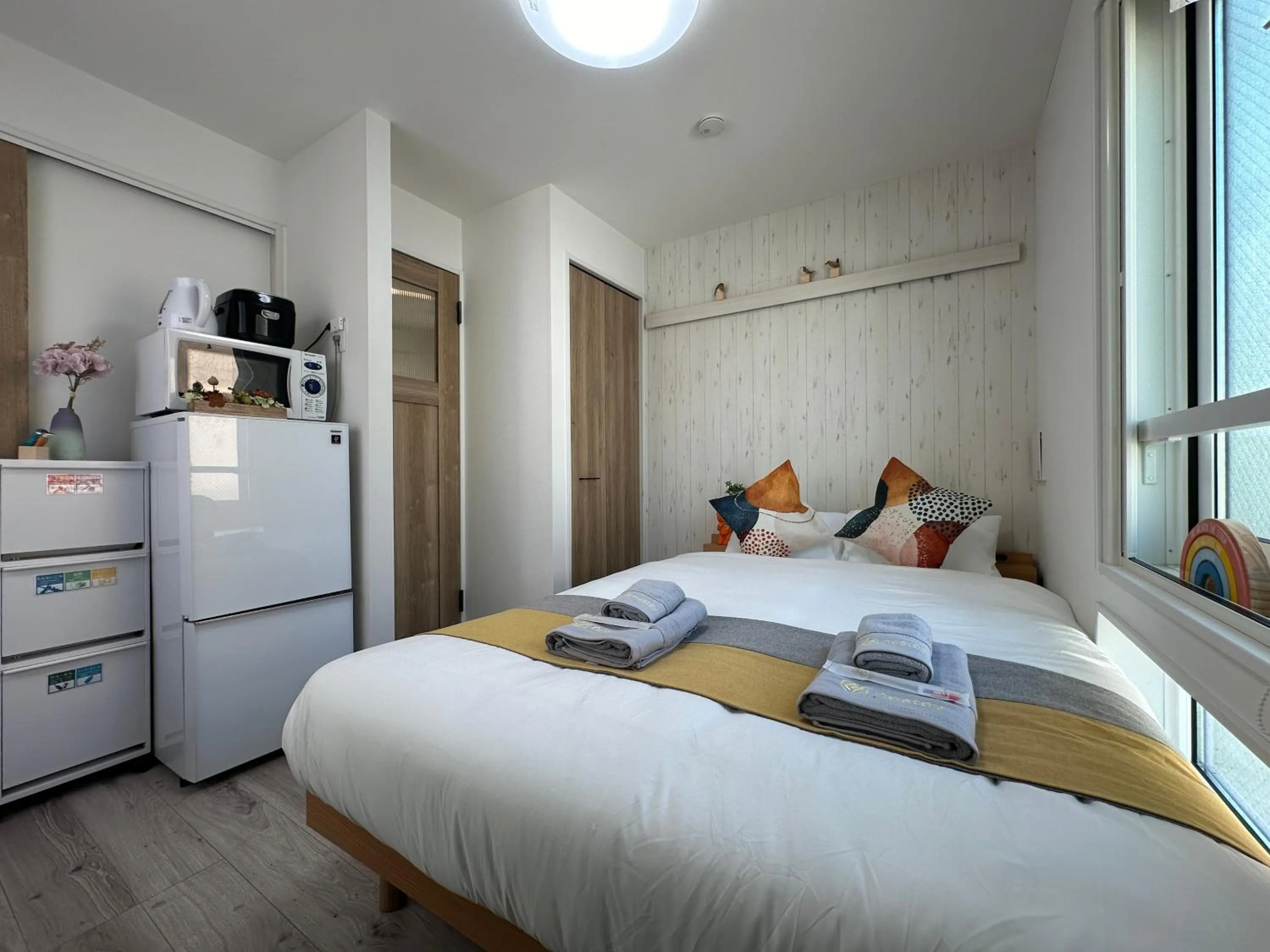 Bed in nestay apartment tokyo waseda