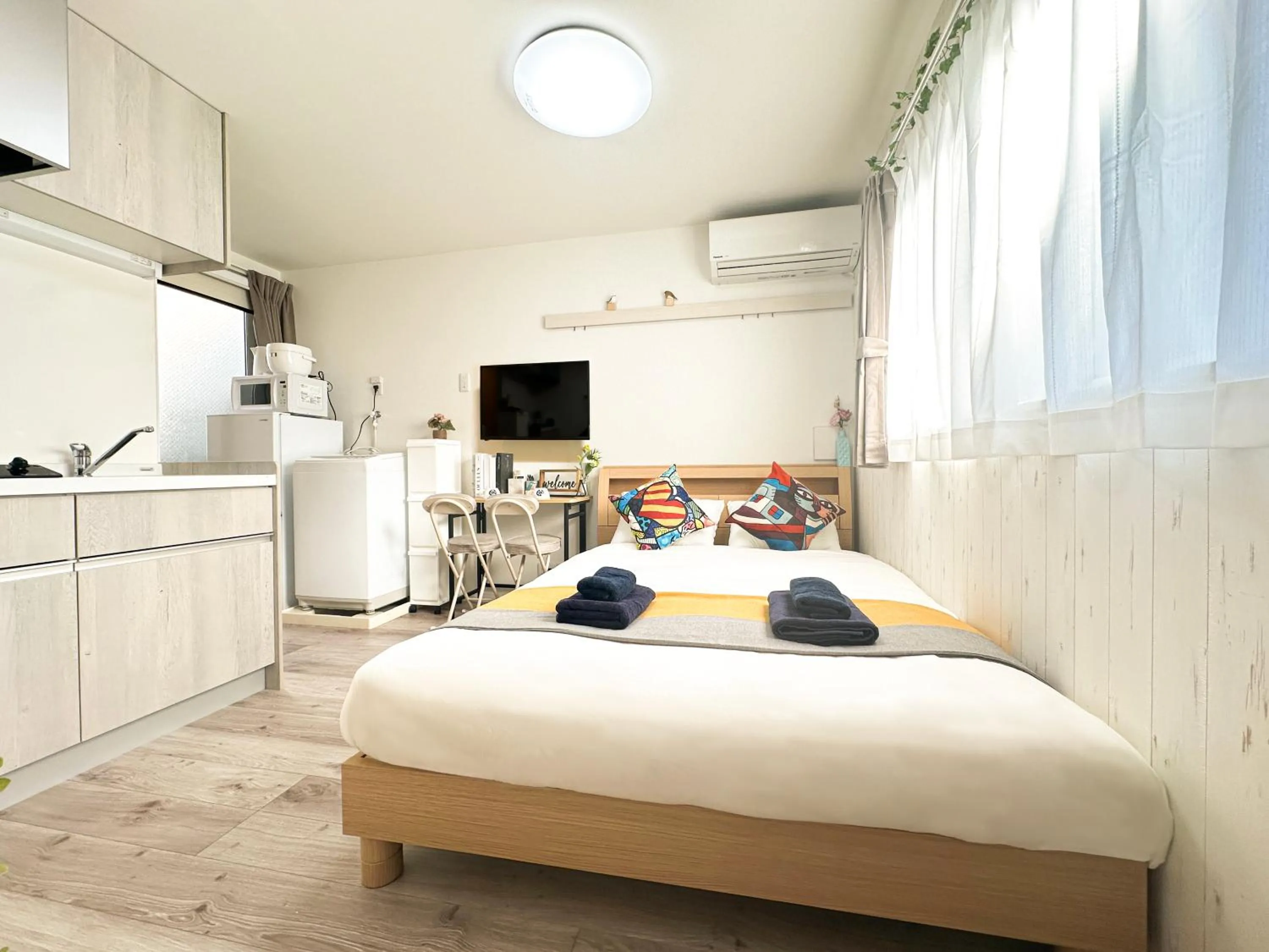 Bed in nestay apartment tokyo waseda