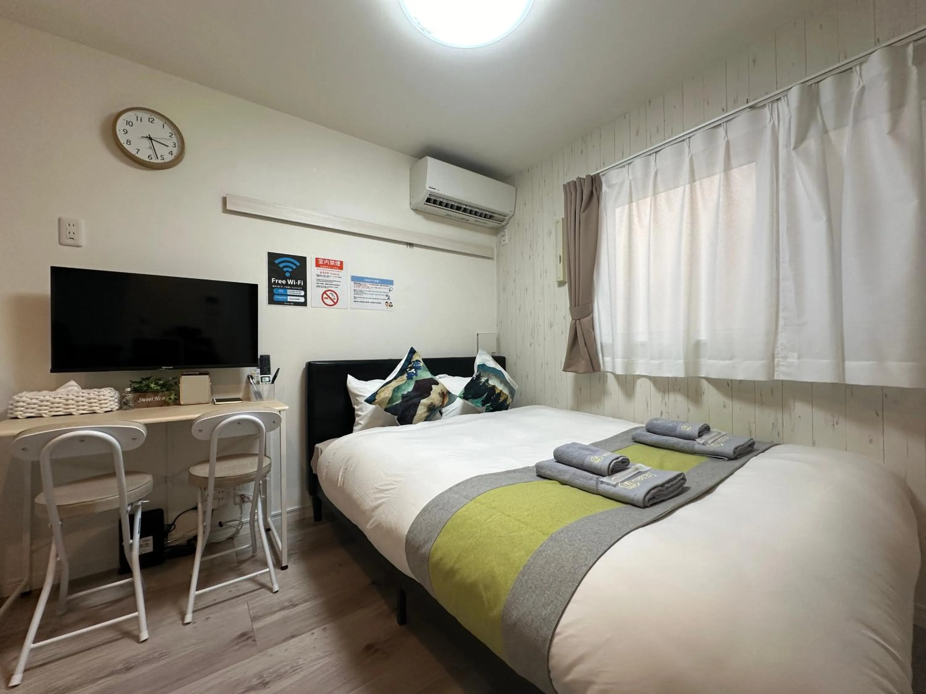 Bed in nestay apartment tokyo waseda