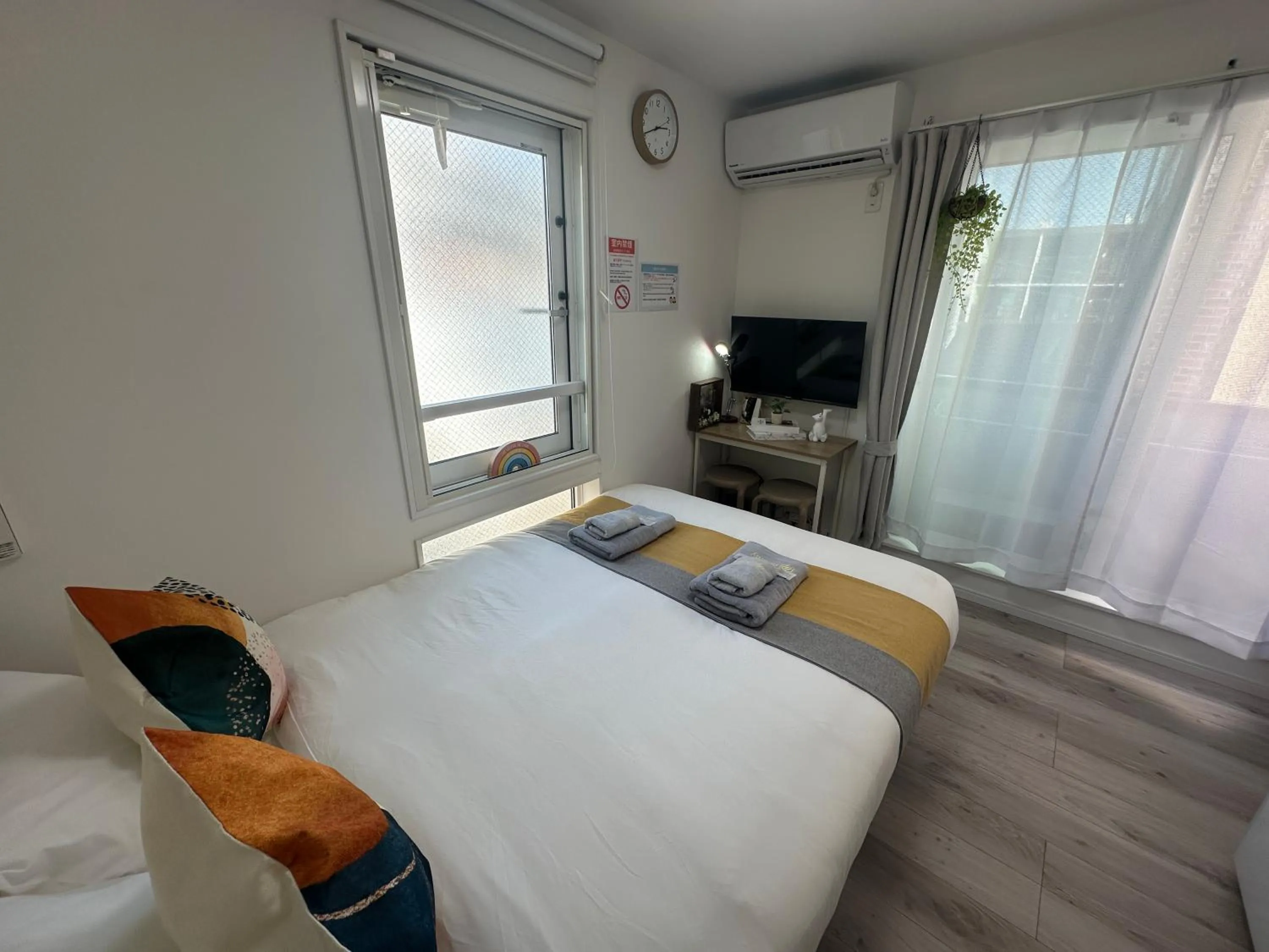 Bed in nestay apartment tokyo waseda