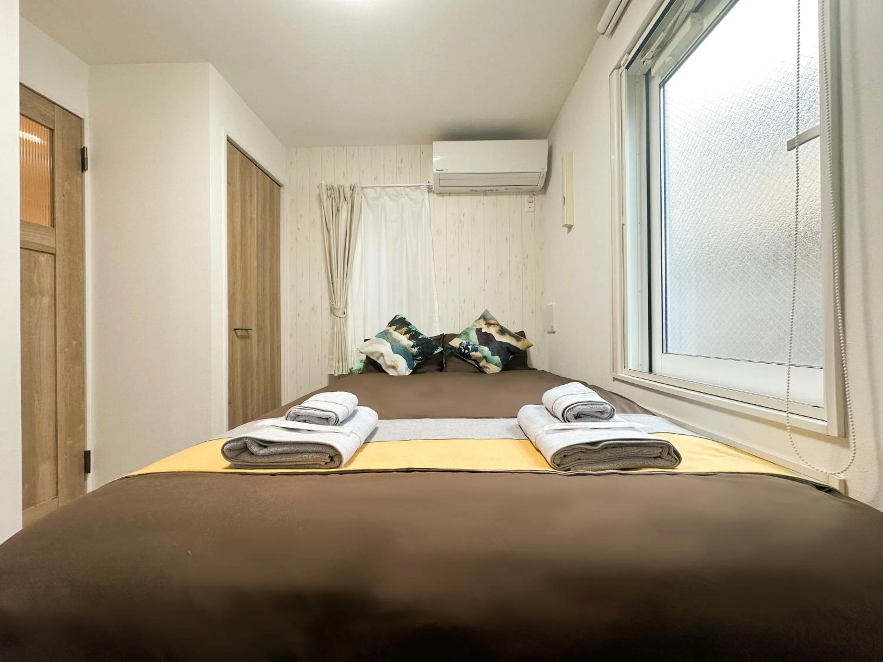 Bed in nestay apartment tokyo waseda