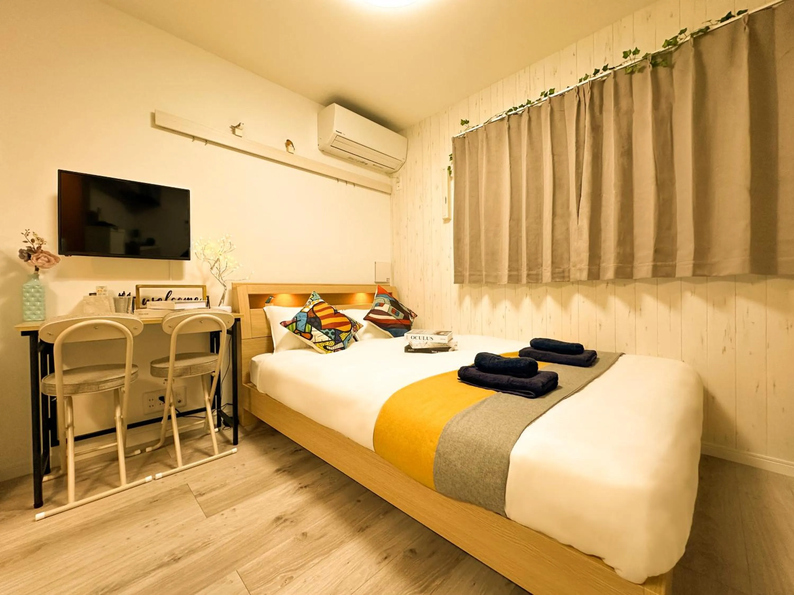 Bed in nestay apartment tokyo waseda