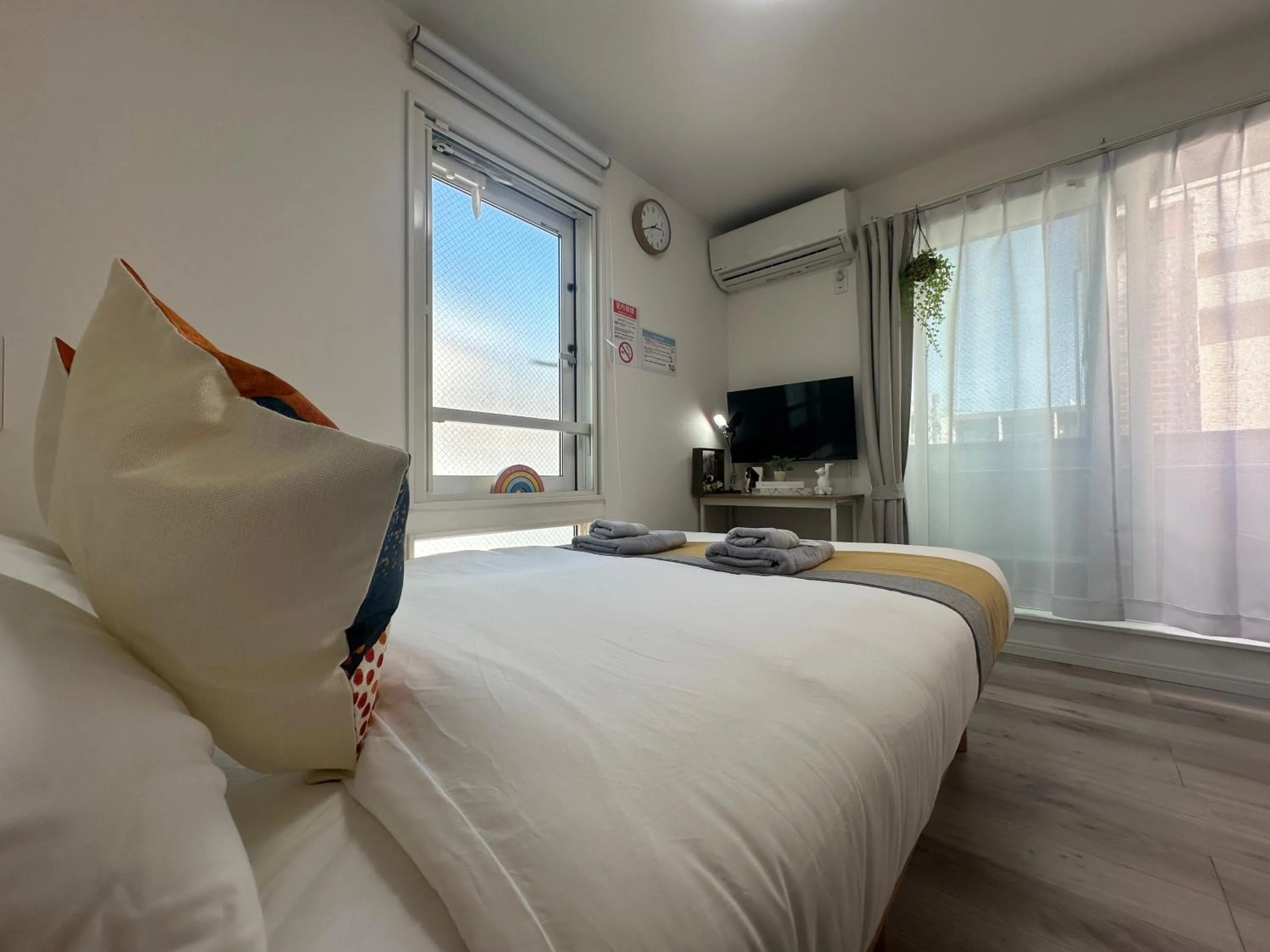 Bed in nestay apartment tokyo waseda