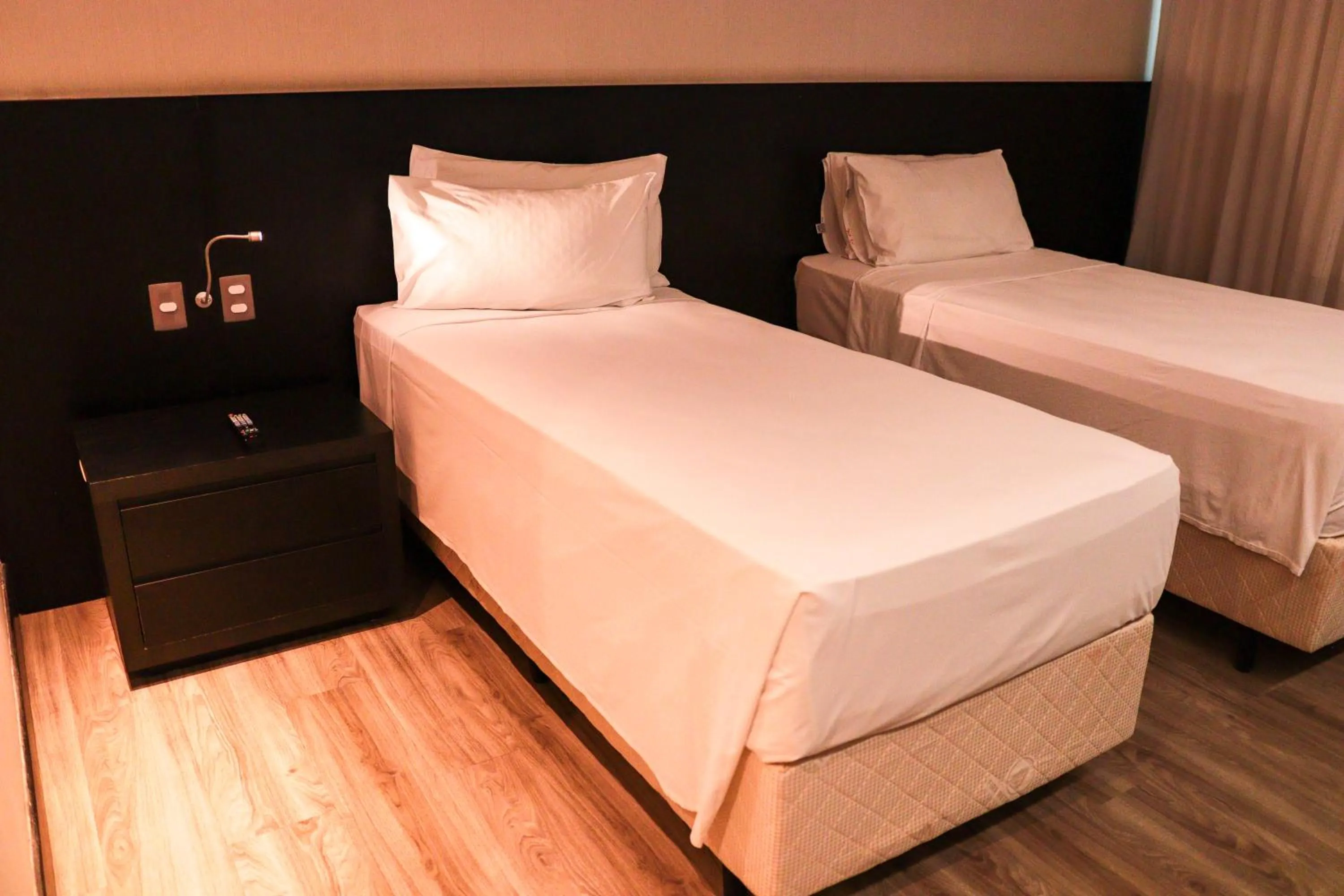 Bedroom, Bed in Cassino Tower Savassi - Próximo a FIEMG