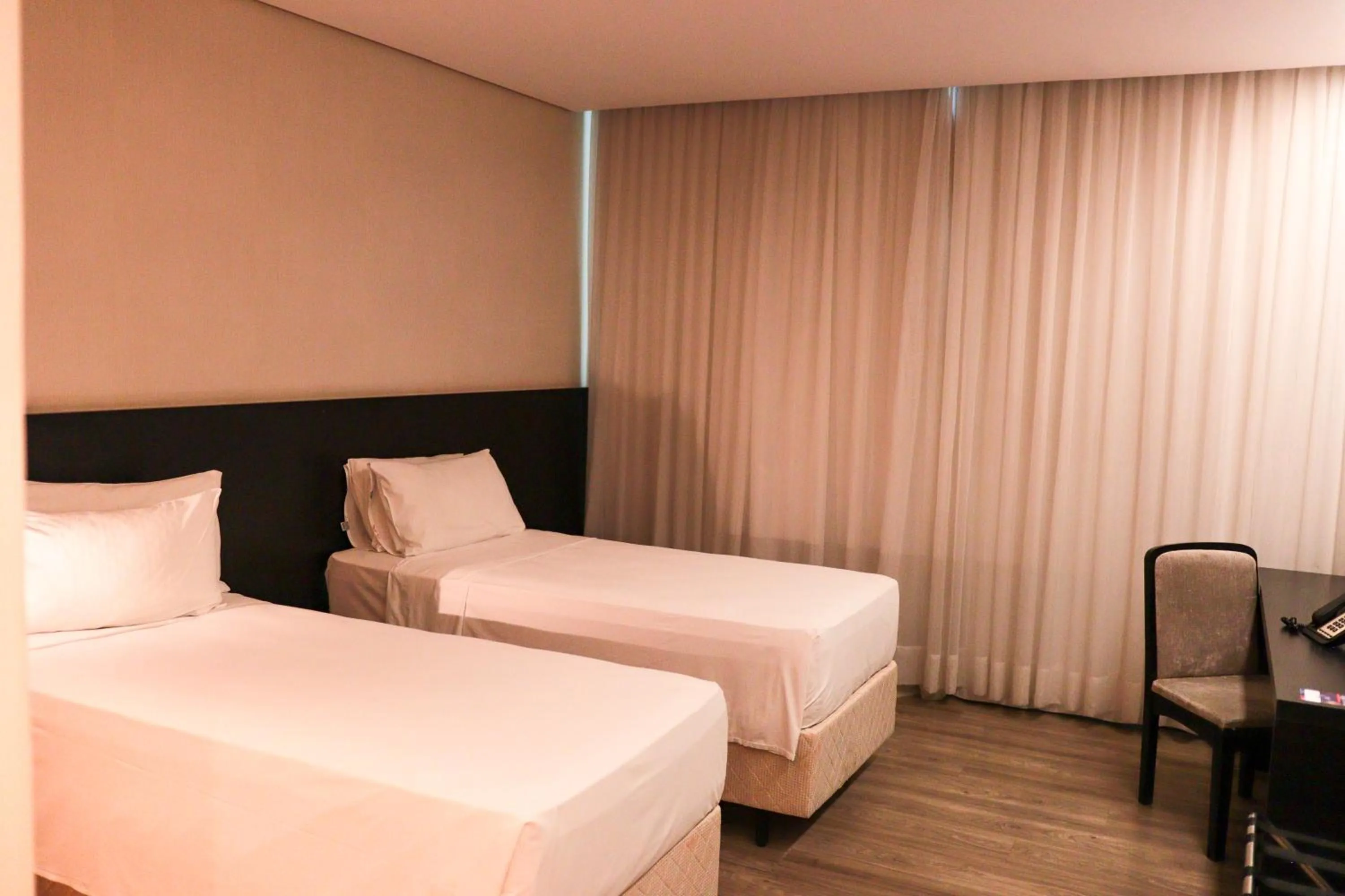 Bedroom, Bed in Cassino Tower Savassi - Próximo a FIEMG