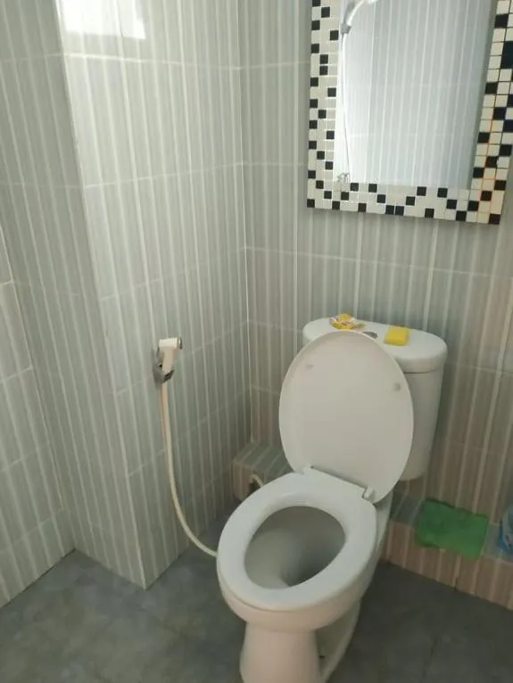 Bathroom in OYO Life 92745 The Margo Monthly Stay