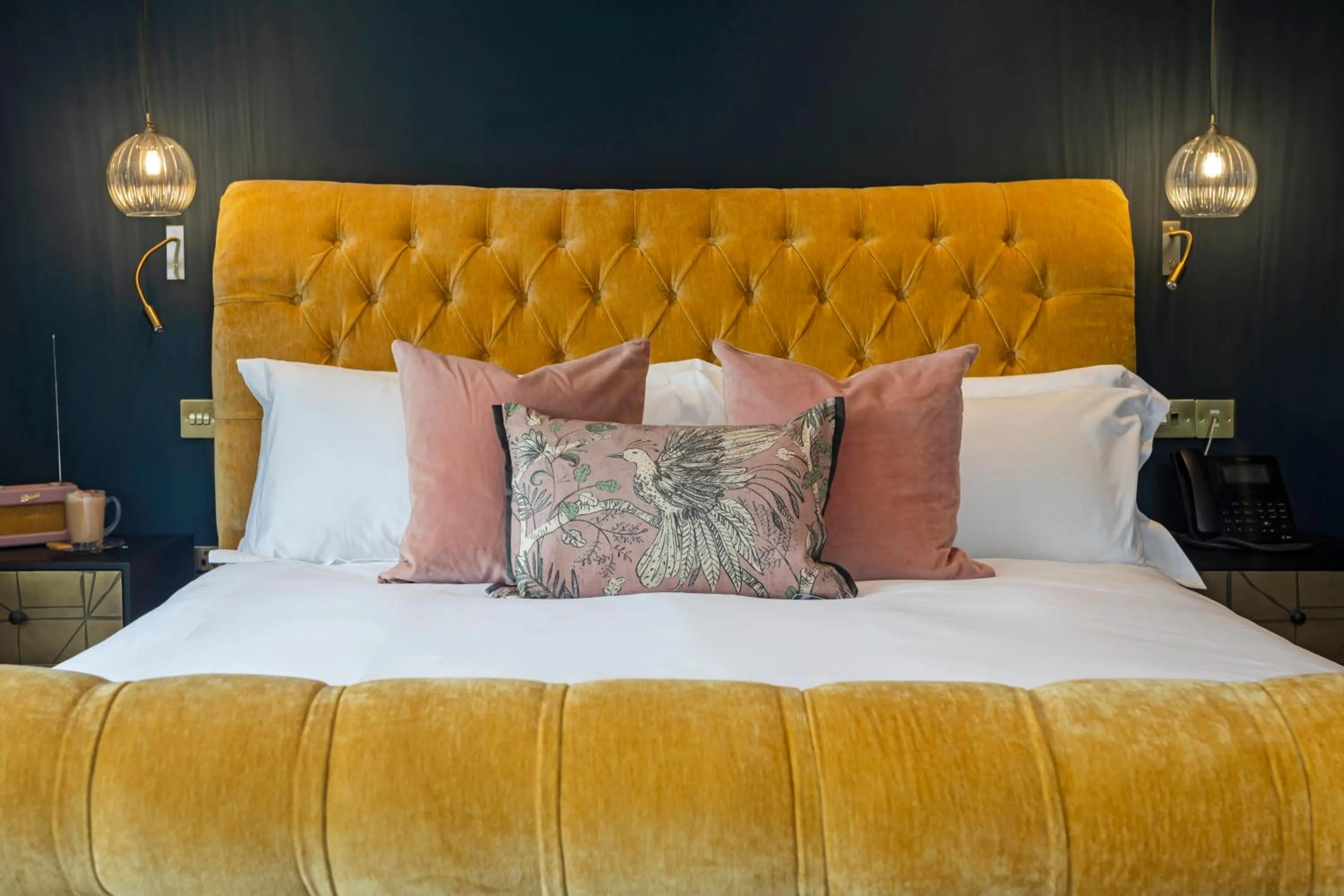 Bed in The Queen's Inn