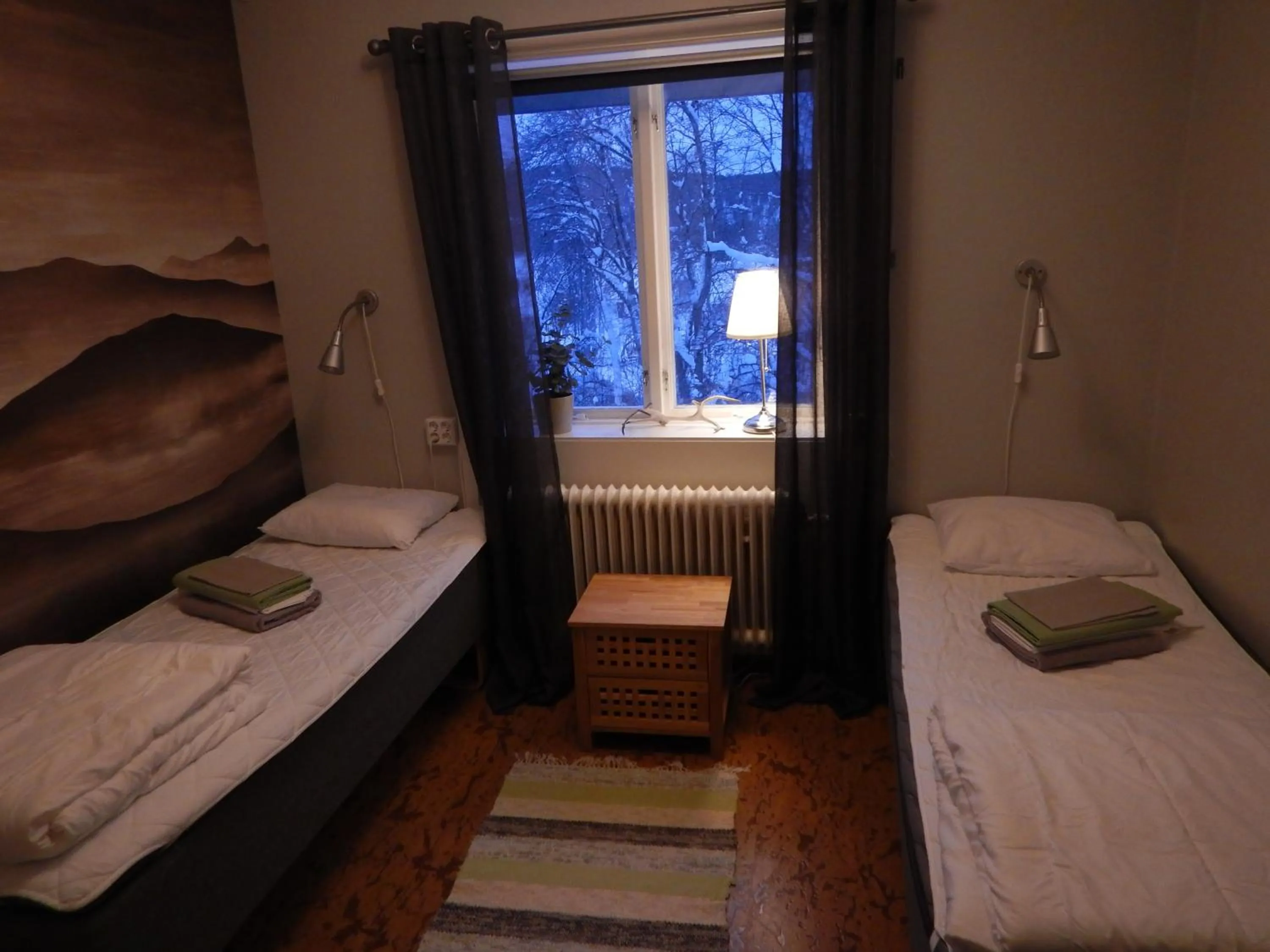 Photo of the whole room, Bed in Jokkmokks Vandrarhem Åsgård