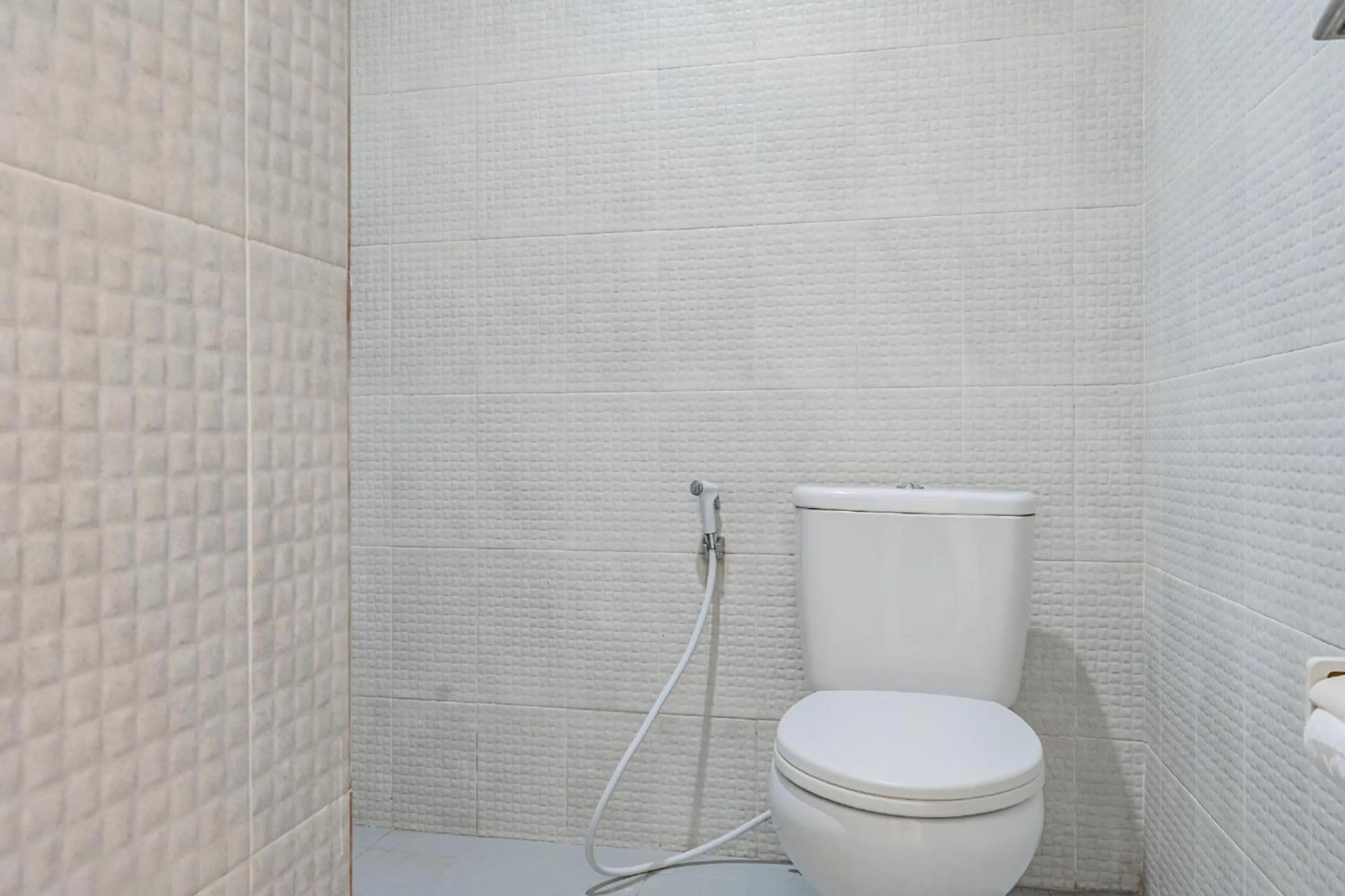 Bathroom in Collection O Kuta Near Airport Ngurah Rai