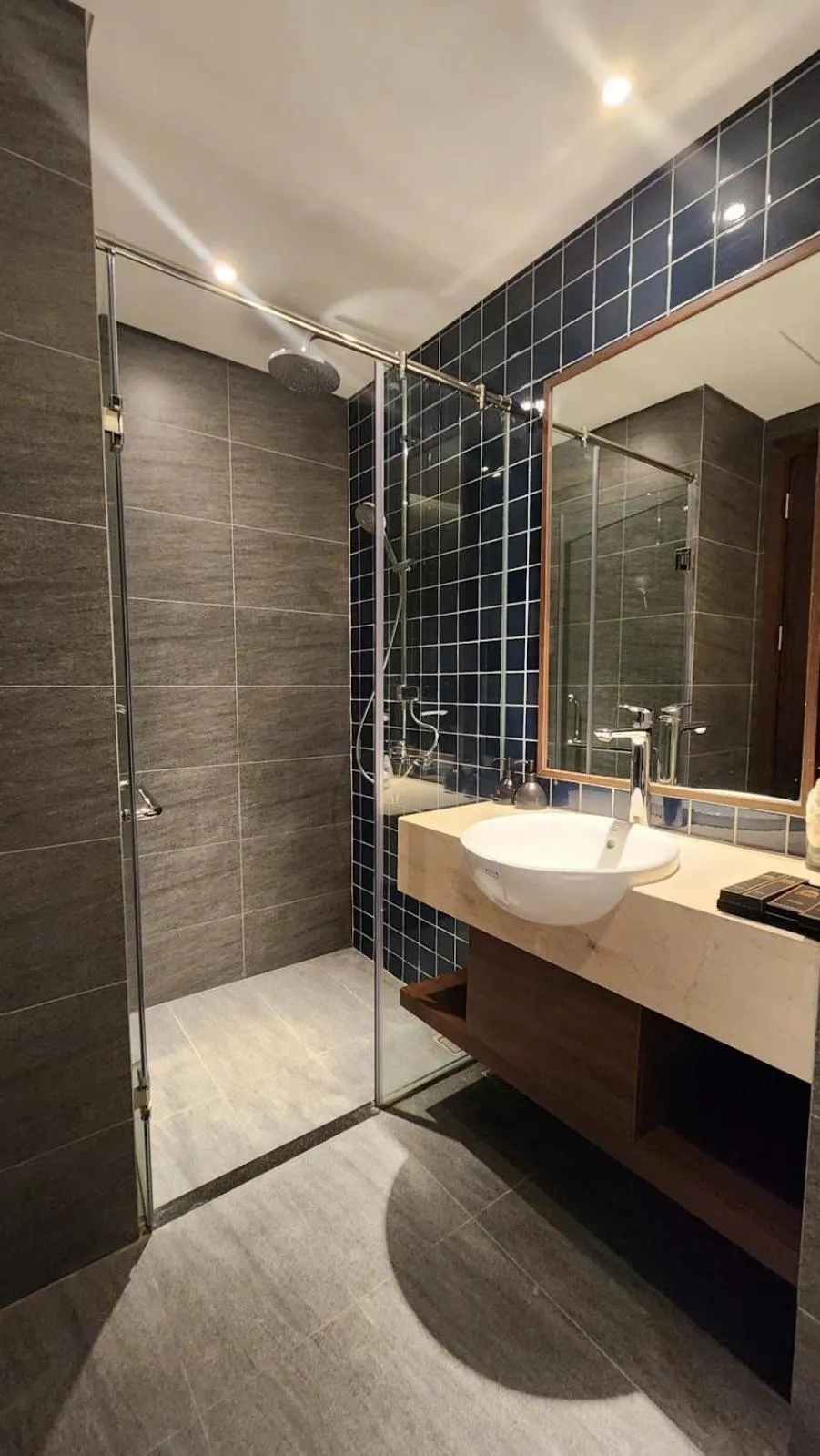 Shower in Apec Luxe Escape Sunset Resort