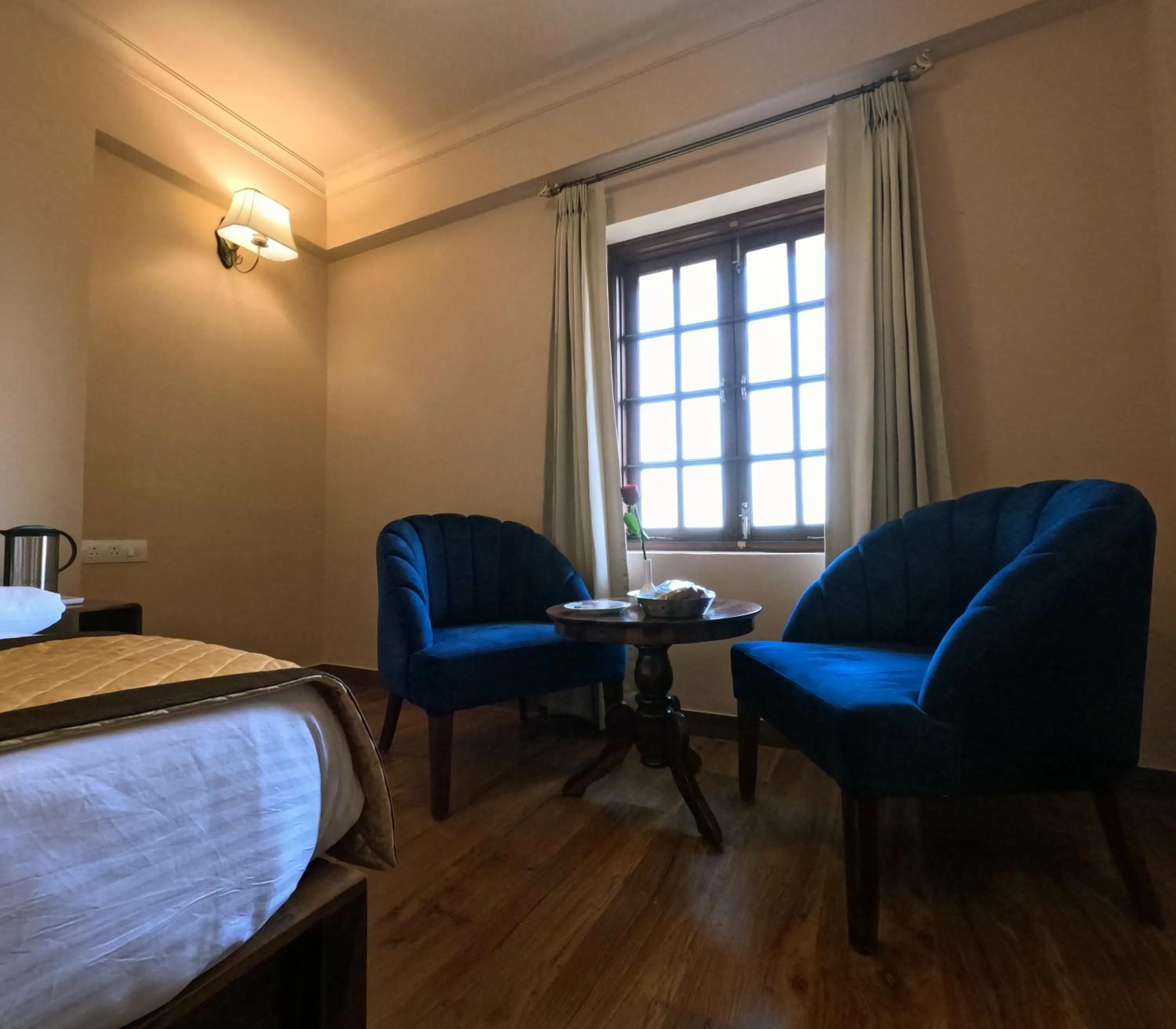 Seating area, Bed in Hotel Chandra Raj Mahal