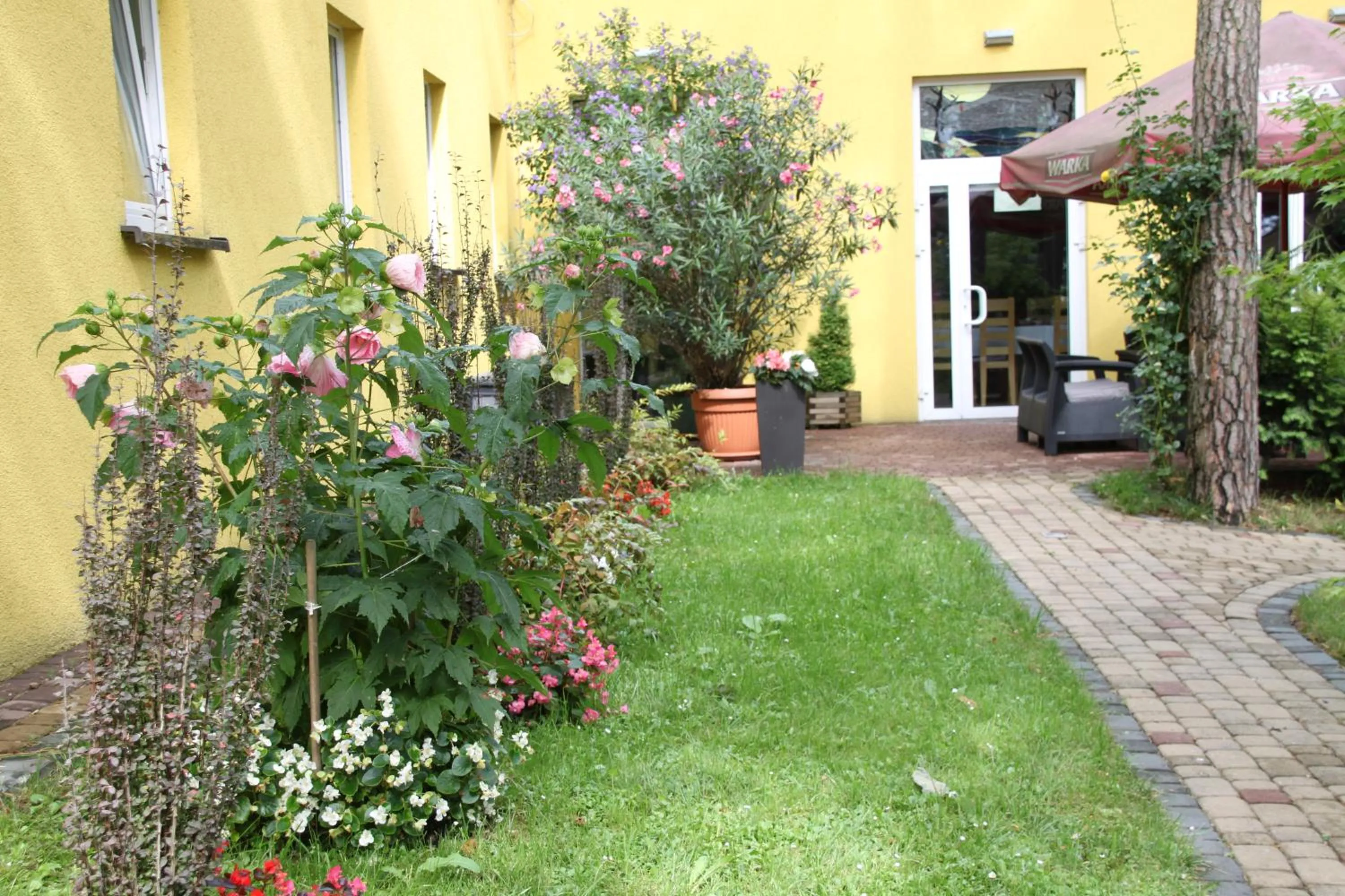 Garden in Hotel Zielony & OW Borowik & Pensjonat Manhattan - Centrum Rekreacji i Wypoczynku GASTROTUR