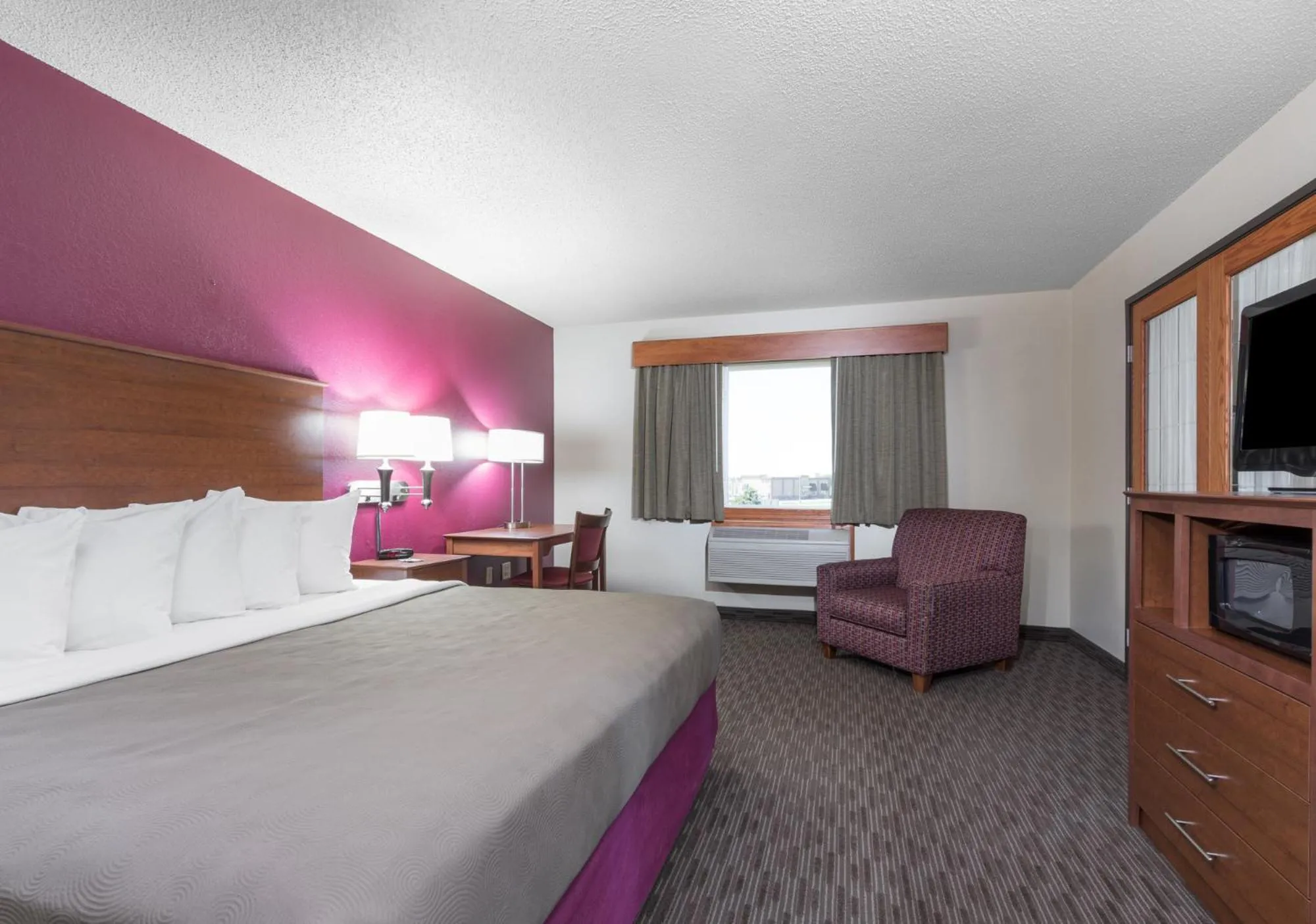 Day, Bed in AmericInn by Wyndham Baldwin