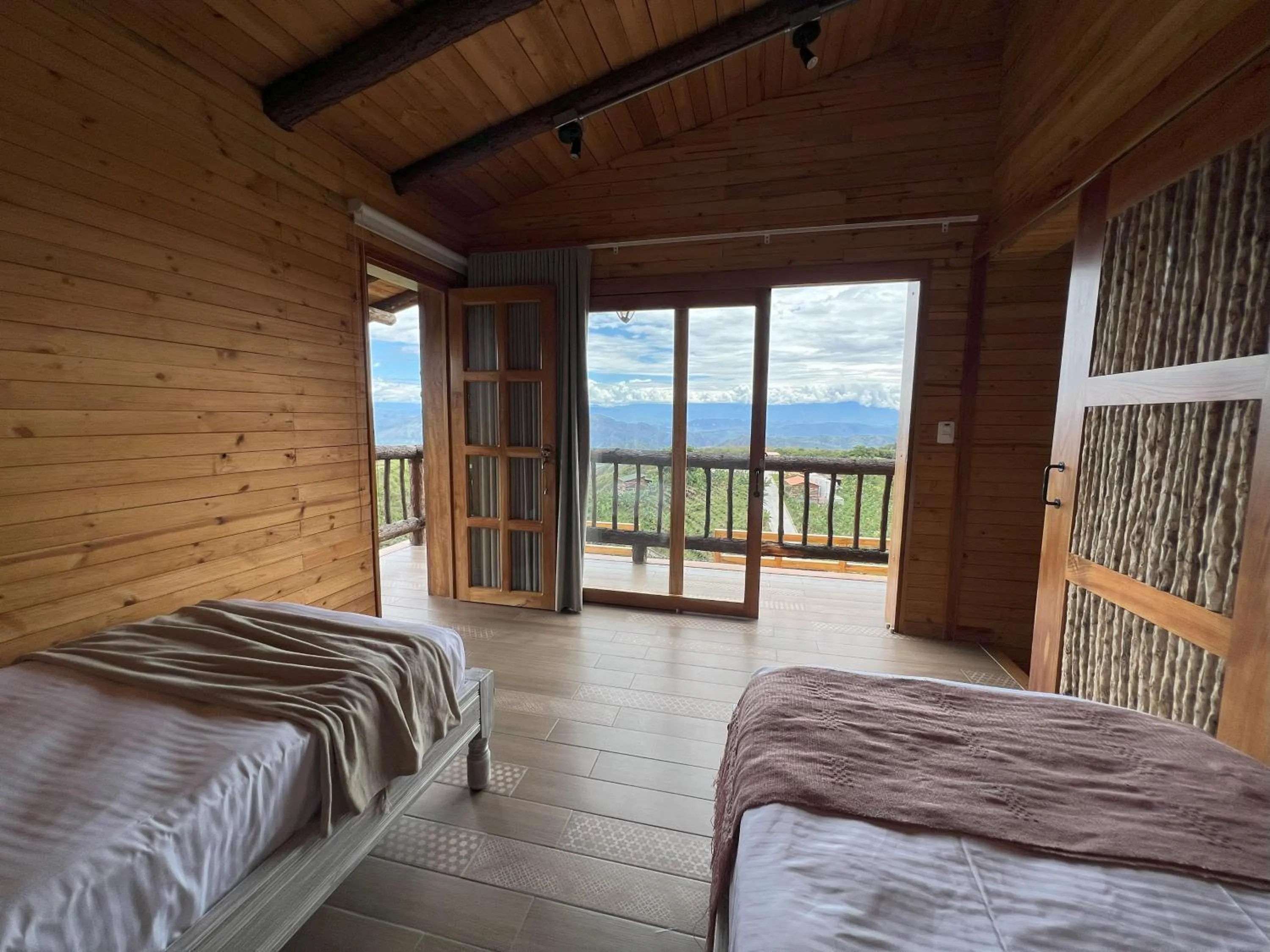 Bed in La Perla Finca Hotel