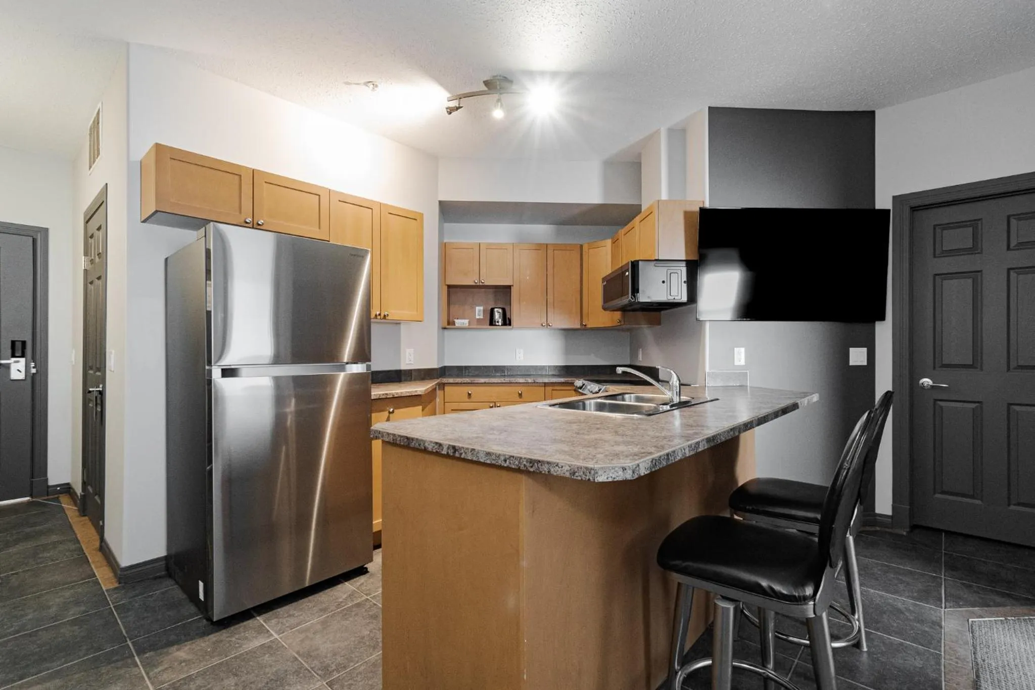 Kitchen or kitchenette in Premier Residence - Fort McMurray