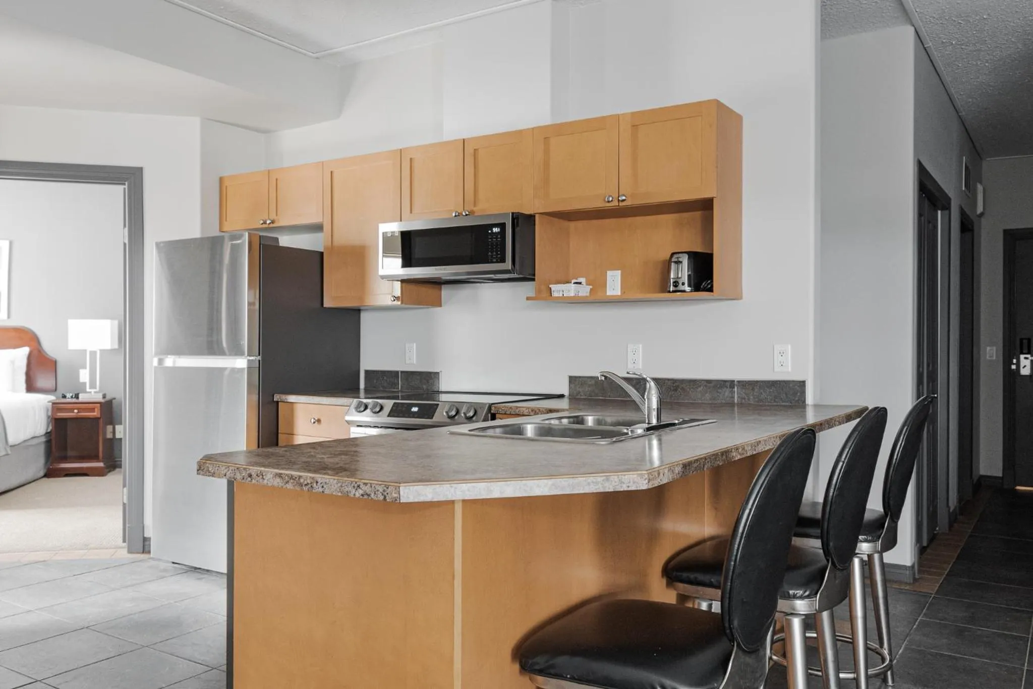 Kitchen or kitchenette in Premier Residence - Fort McMurray