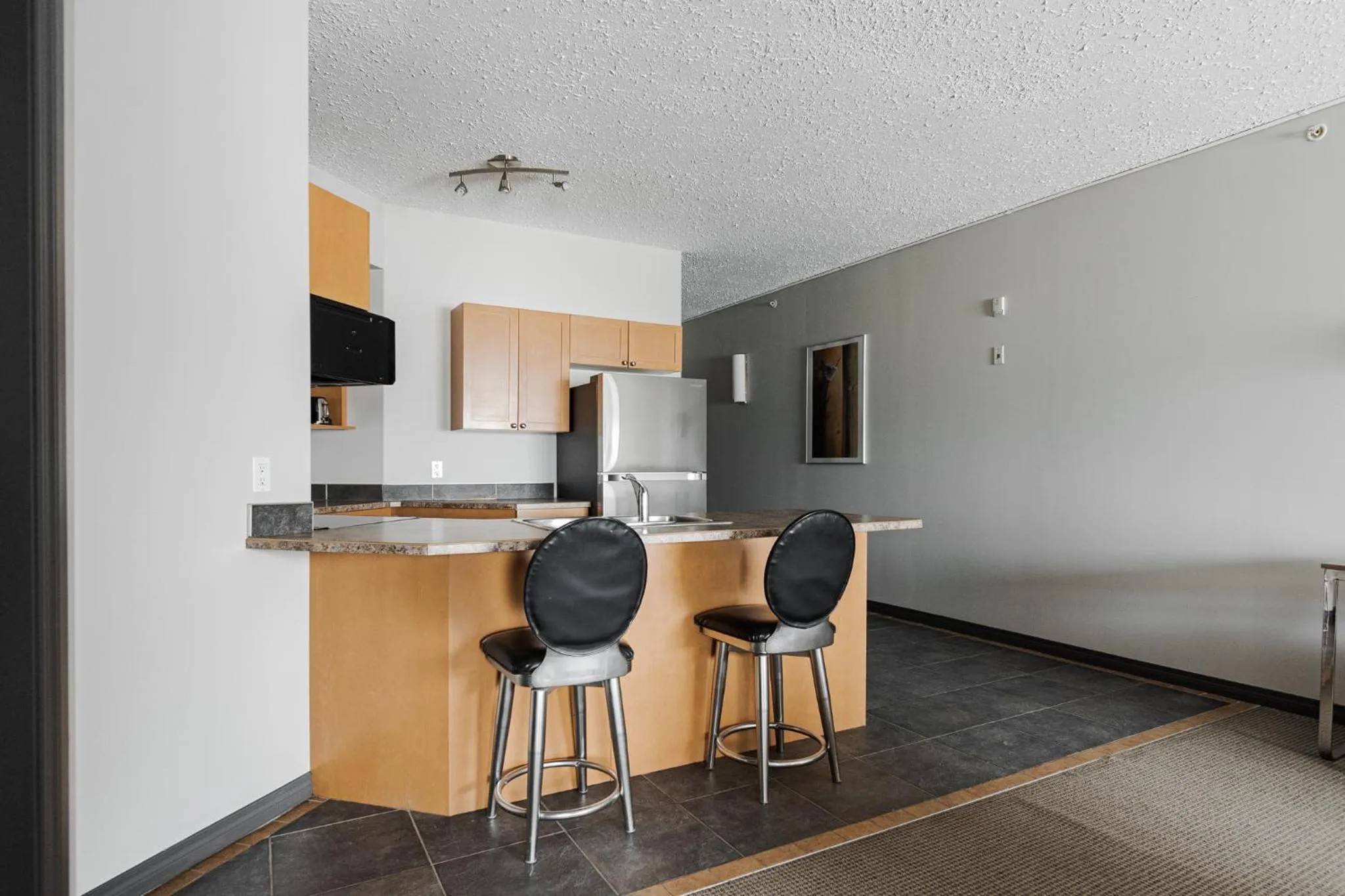 Kitchen or kitchenette in Premier Residence - Fort McMurray