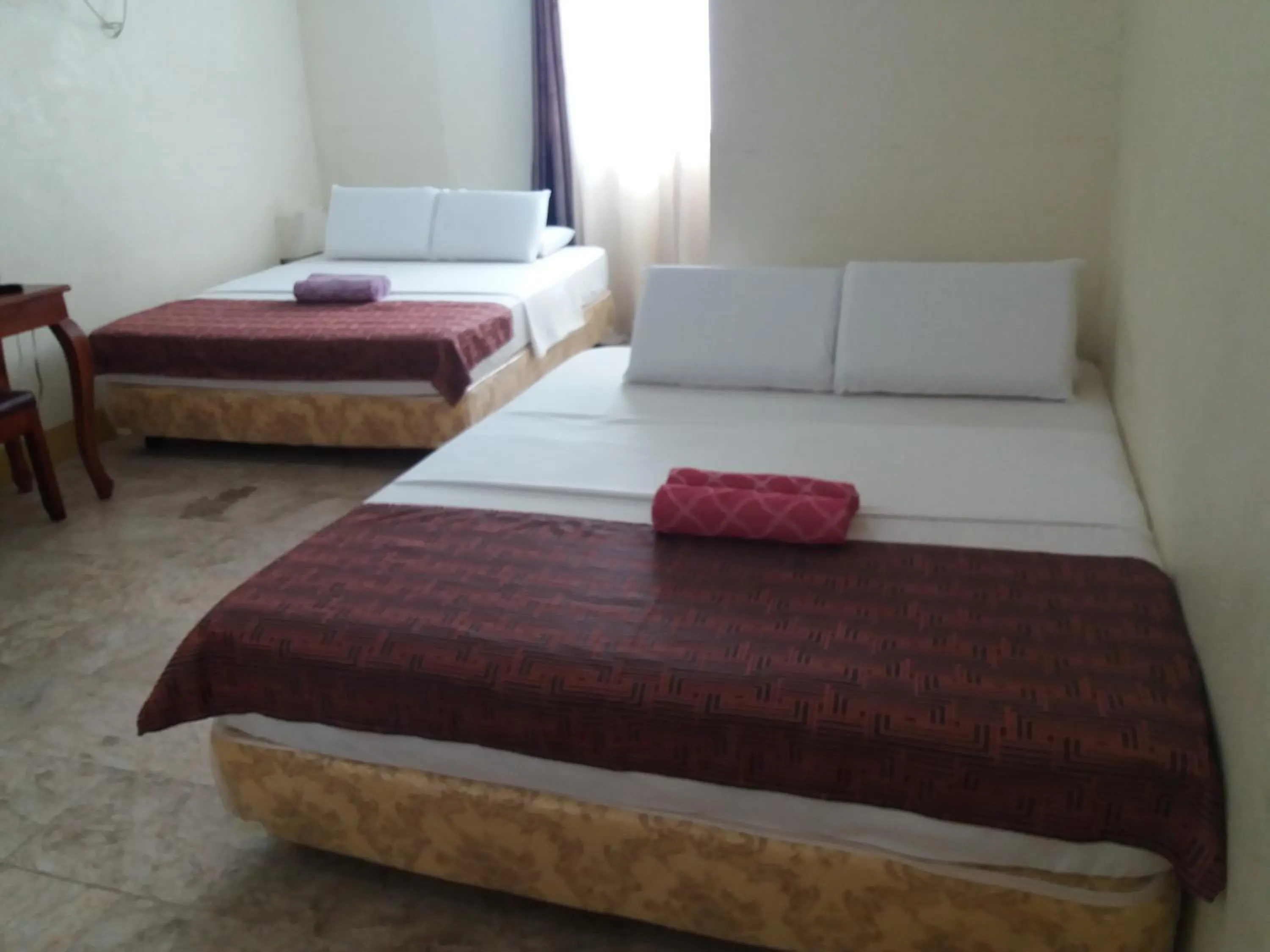 Bed in Sascha's Resort Oslob