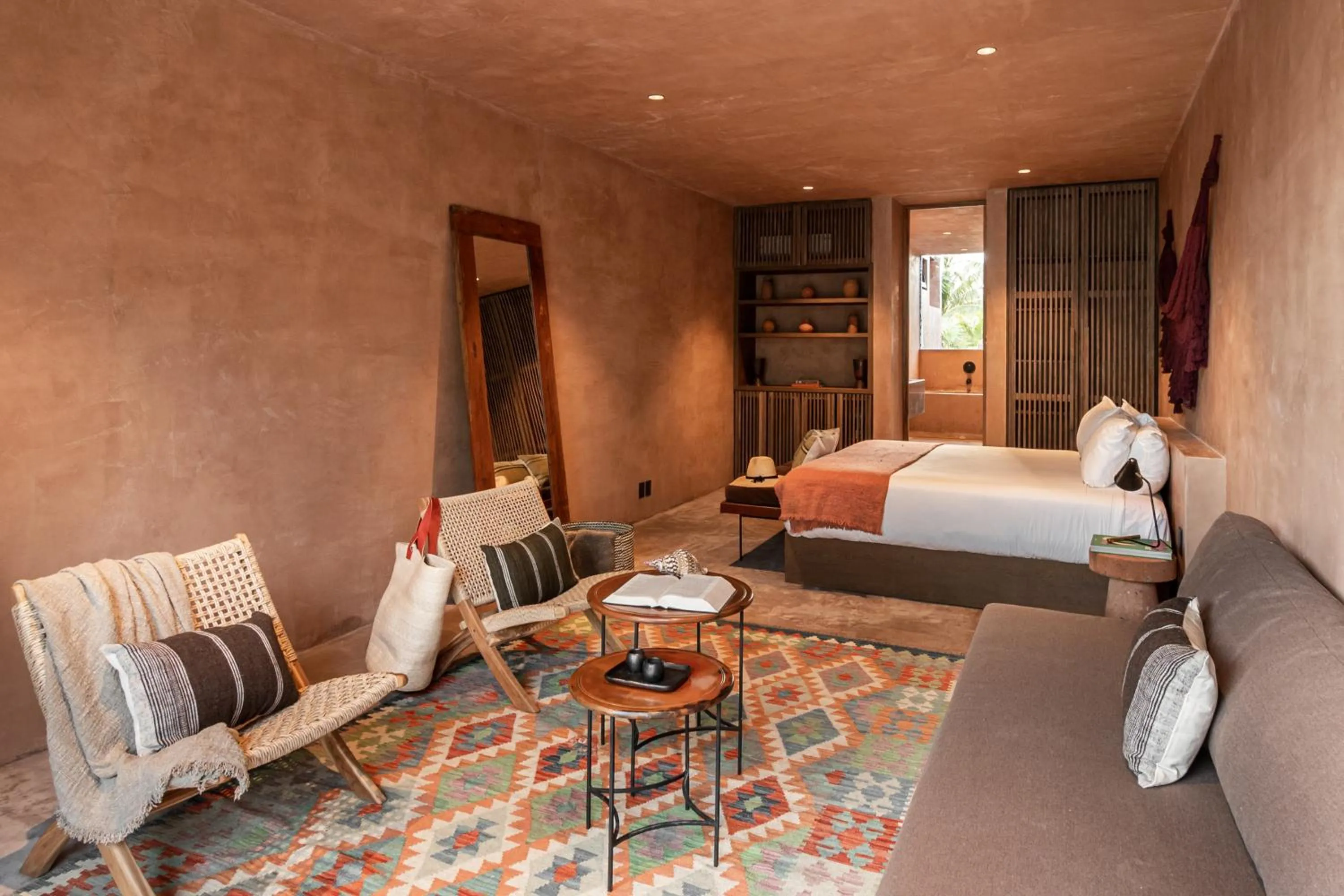 Living room, Bed in Xela Tulum, a Member of Design Hotels