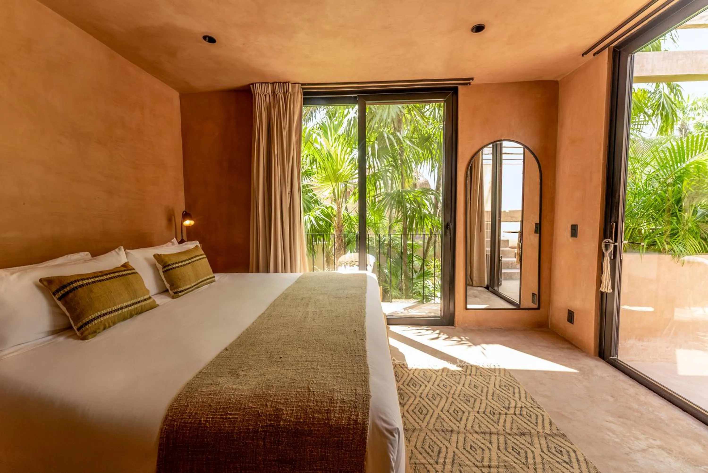 Bed in Xela Tulum, a Member of Design Hotels