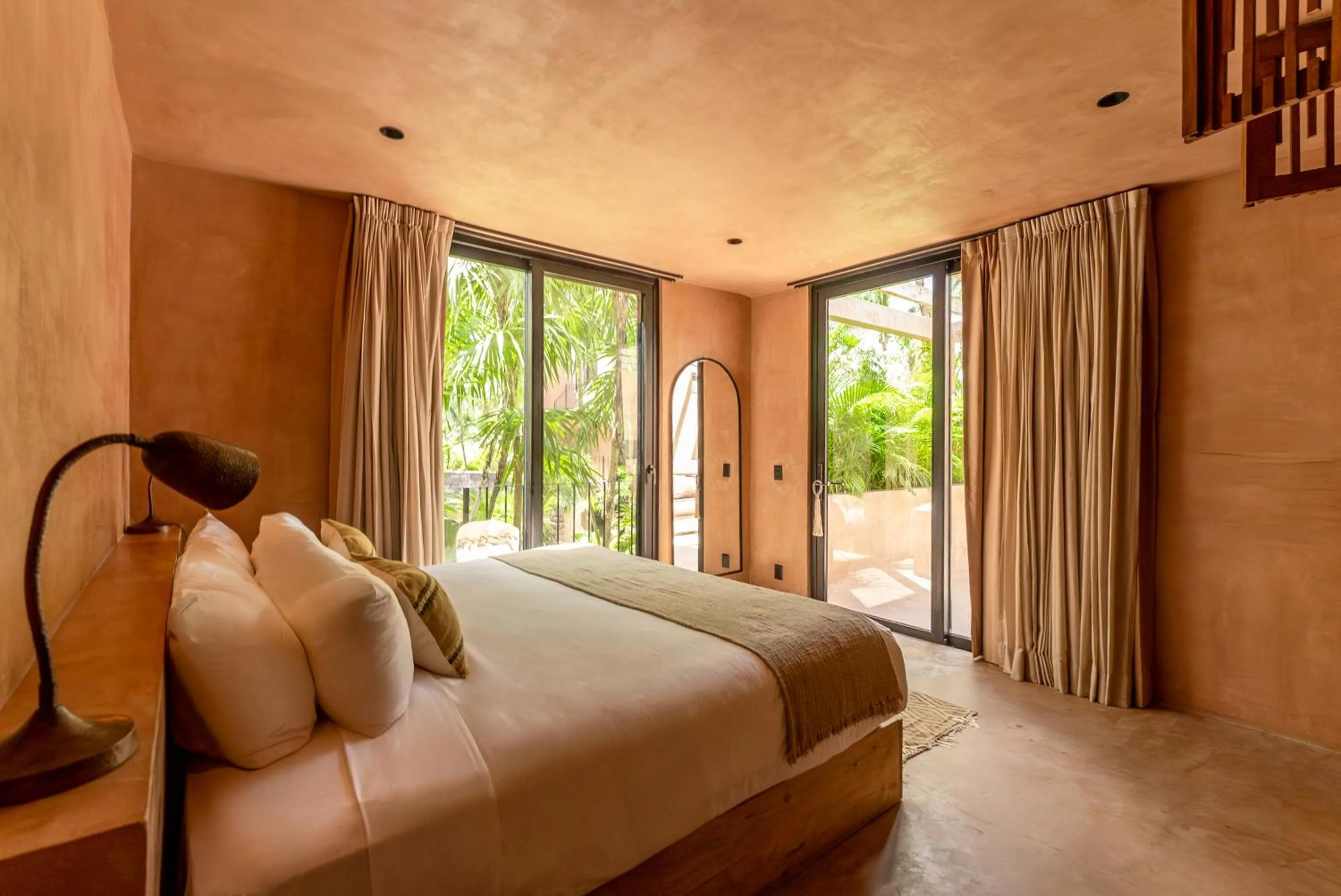 Bed in Xela Tulum, a Member of Design Hotels