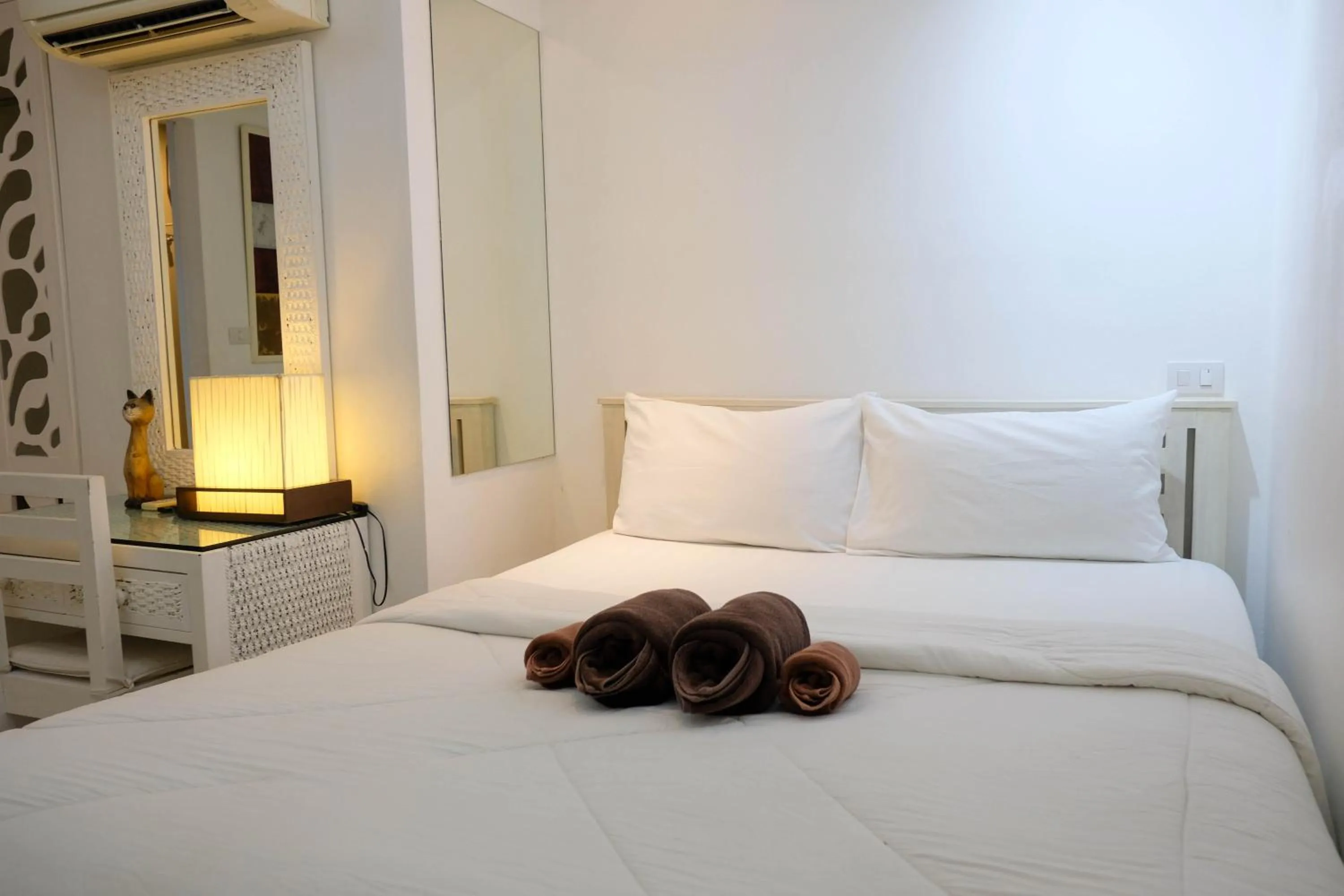 Bed in Baanpoon Apartment