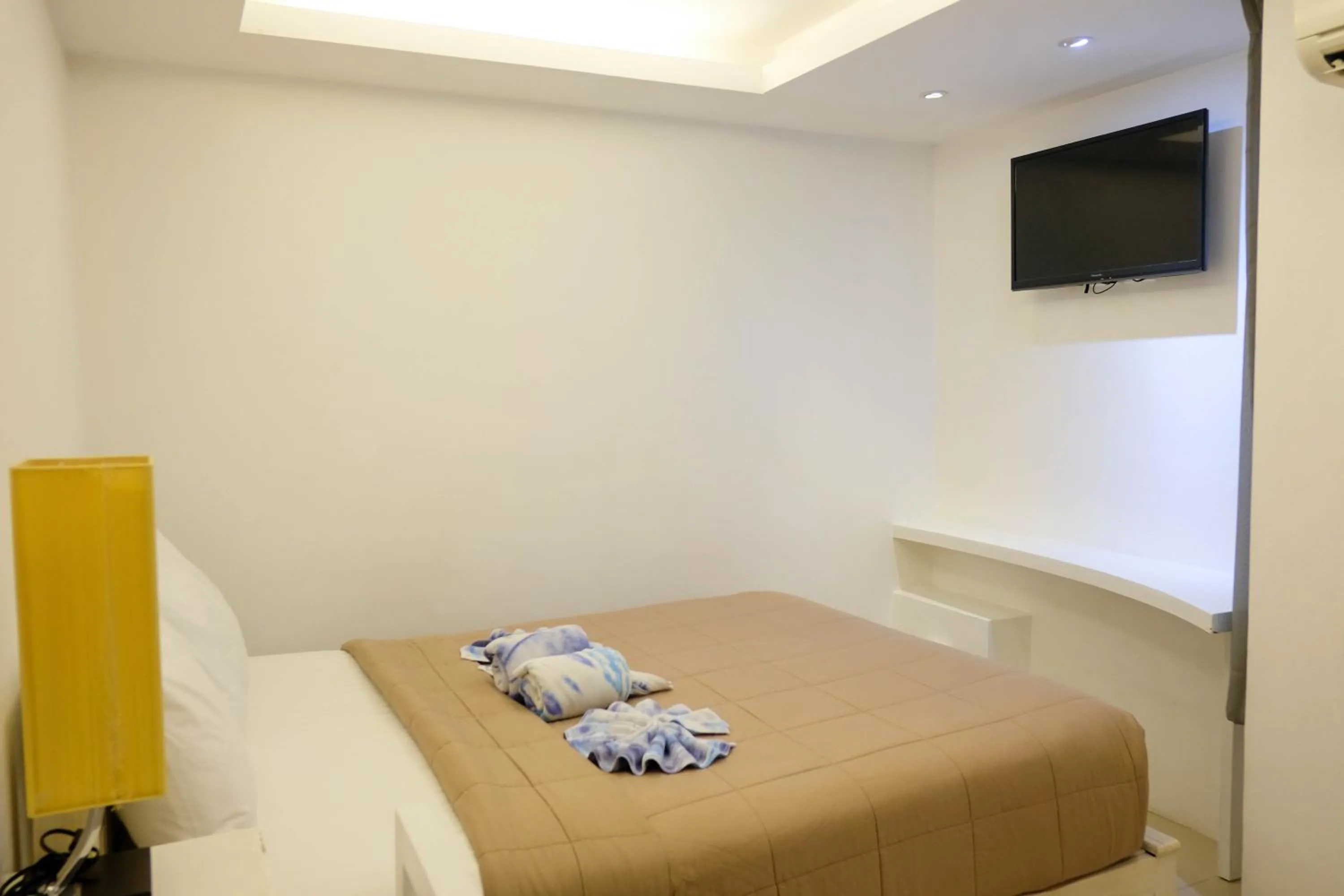 Bed in Baanpoon Apartment